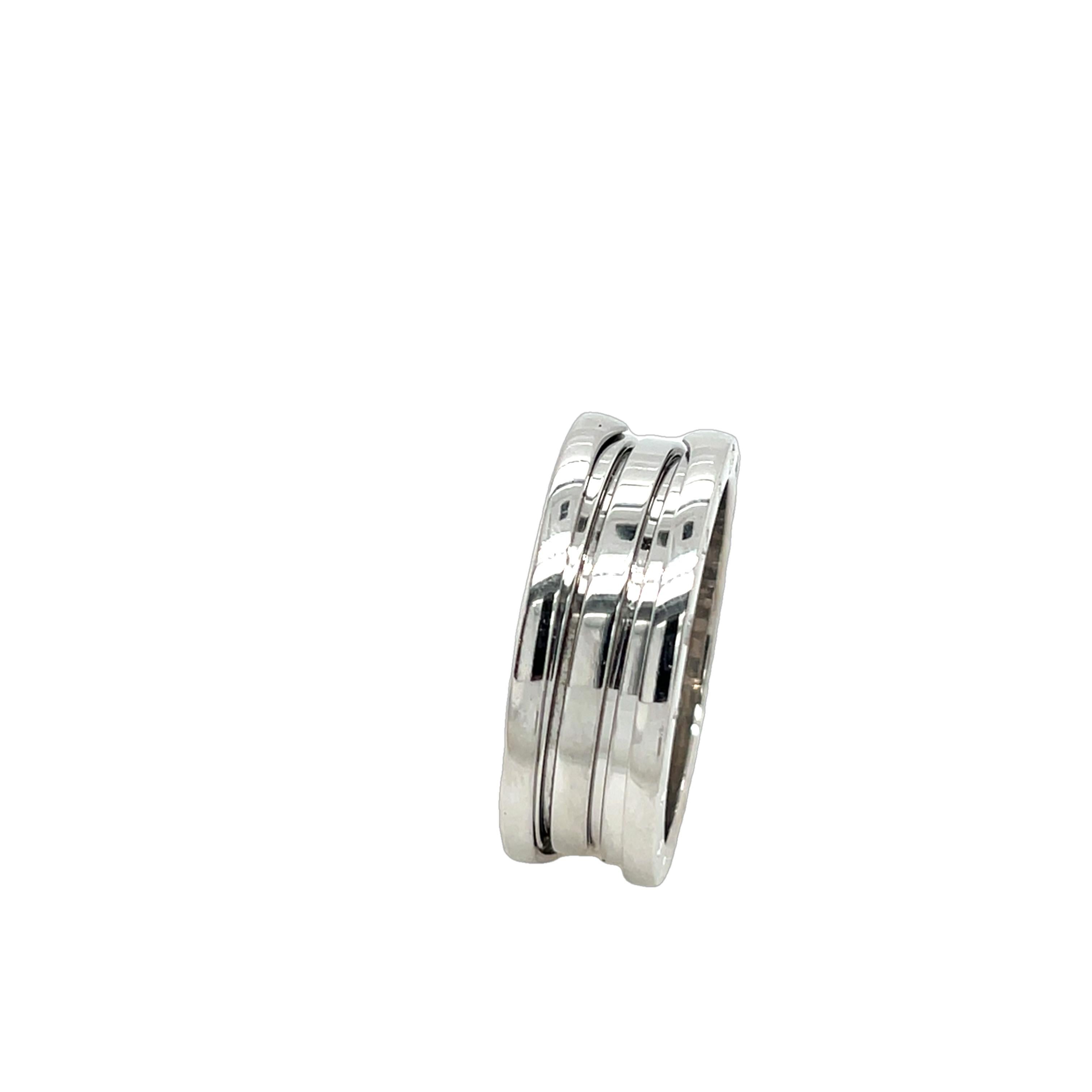 The Bvlgari B.Zero1 3-Band Ring is a symbol of contemporary sophistication, 
crafted in 18ct white gold. Its iconic spiral design reflects the bold 
and innovative spirit of Bvlgari, making it a timeless statement piece. 
Ideal for any occasion,