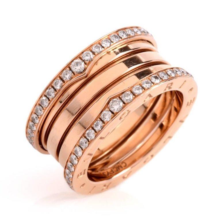 B. zero 1 ring in 18 Kt rose gold set with pave diamonds on the edges. This authentic Bvlgari 4-band eternity rig from the highly prized Bvlgari B.Zero 1 Collection is crafted in solid 18 karat rose gold, weighing 12.9 grams and measuring 12 mm