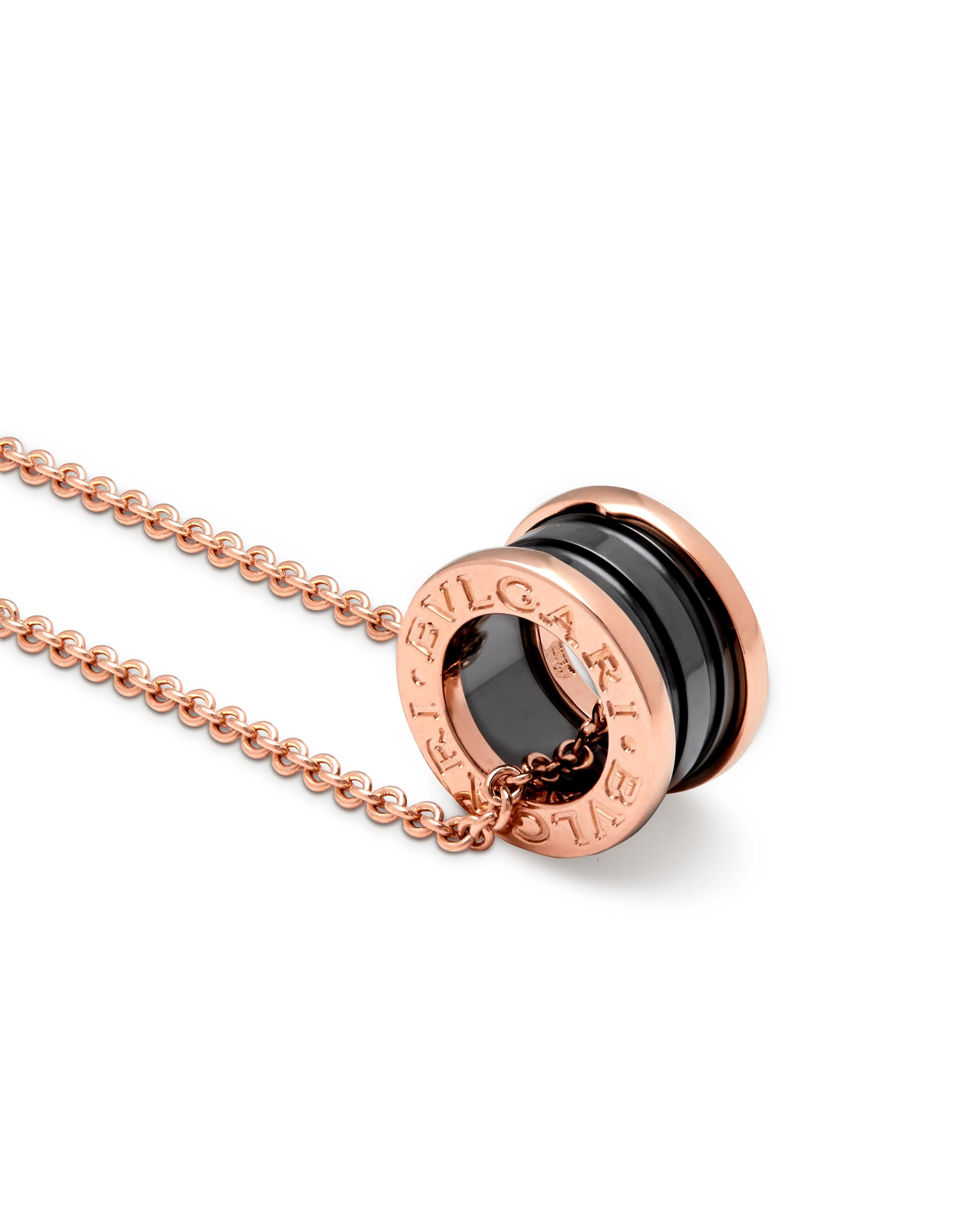 Bulgari B-Zero rose gold and black ceramic pendant model number 358050

This beautiful classic pendant can be worn at 18 inches, with a ring at 17,16,15 inches so you have the option to wear it at different lengths. 

This Bulgari pendant draws its