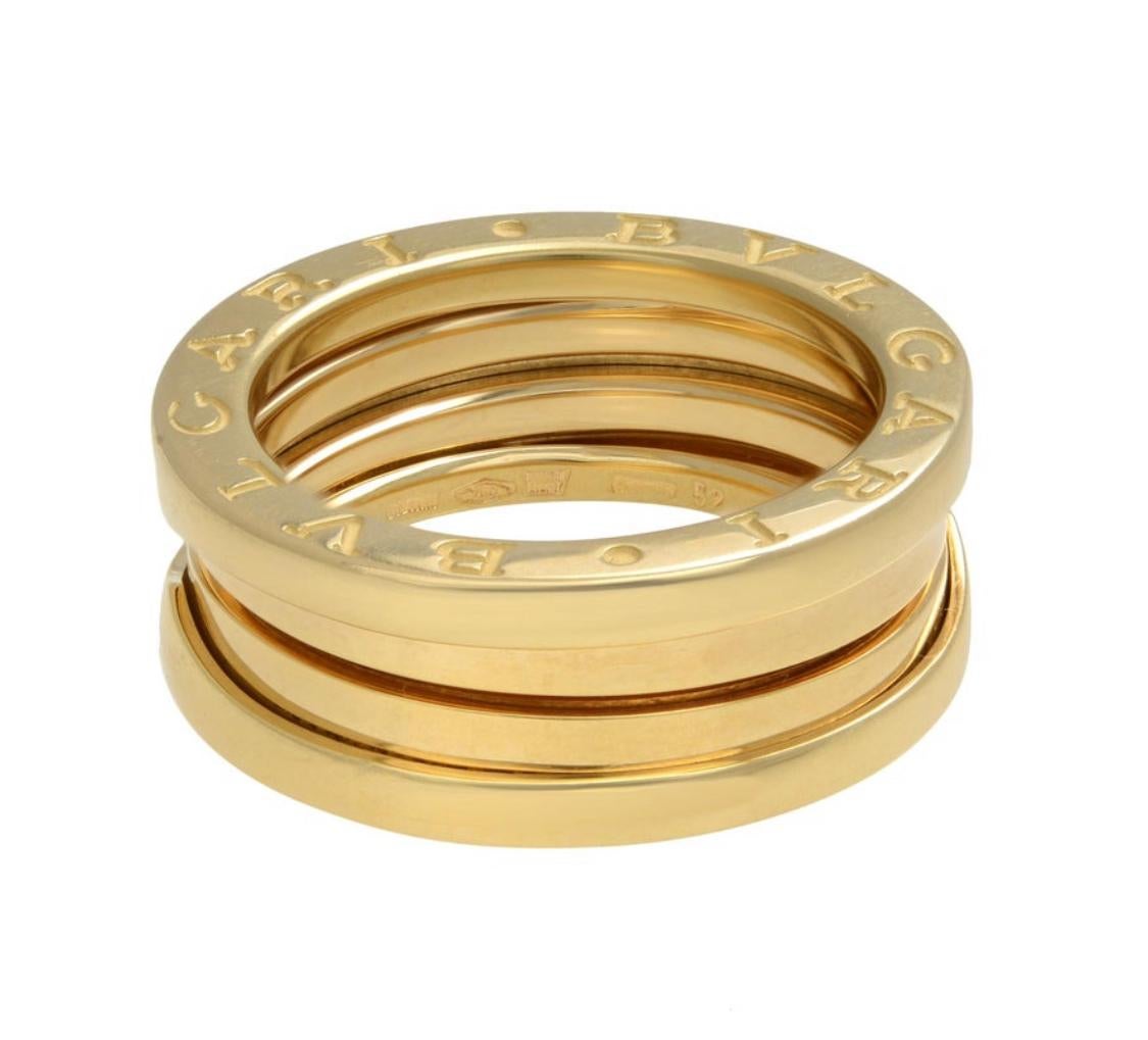 8k yellow gold band ring from Bvlgari Bzero1 collection. This style is showcasing strong bold lines in solid yellow gold, engraved Bvlgari. Ring size  US 6.5. Width: 7.50mm. Thickness 2.80mm. Mint Condition. Original box included.

About us: