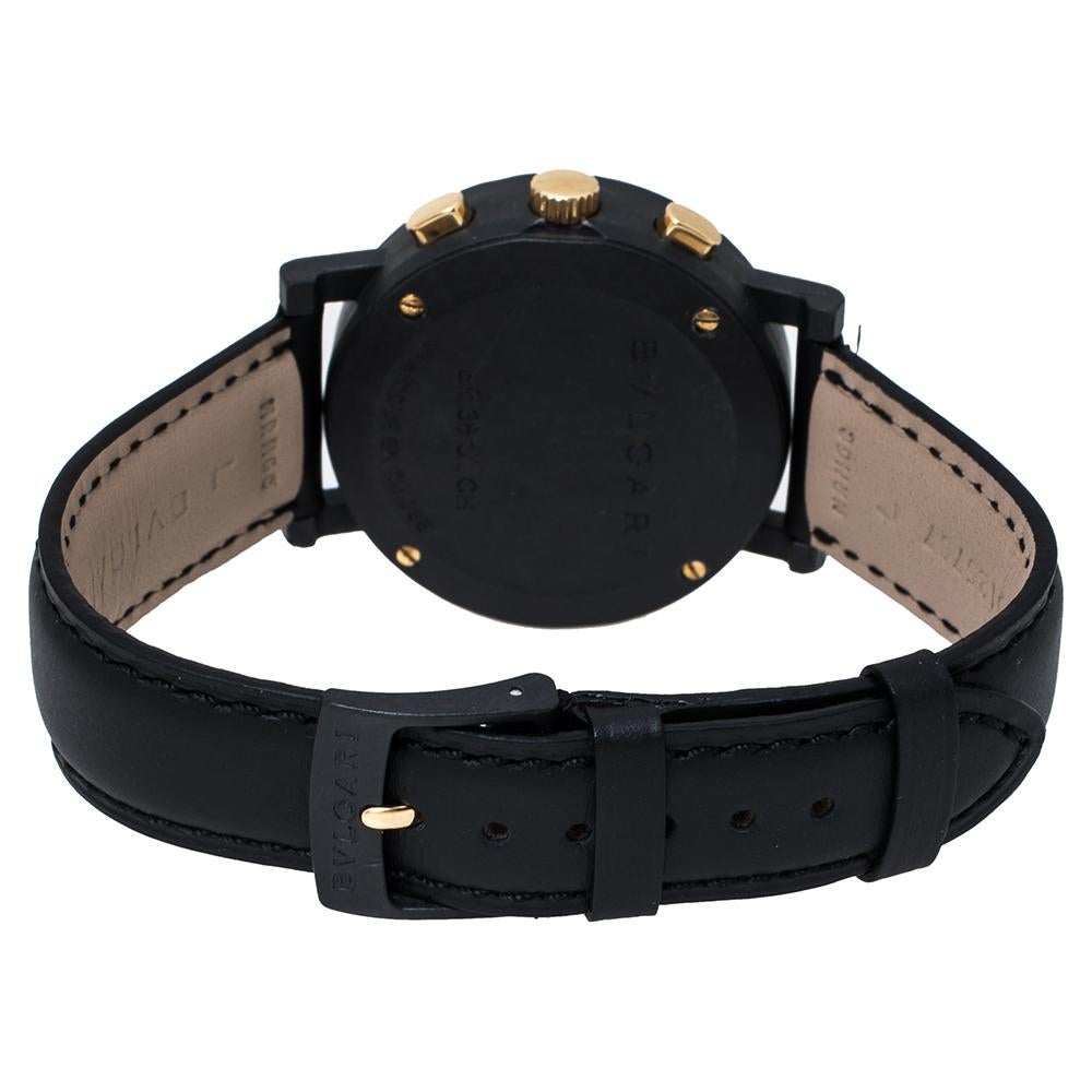 This limited edition BB38CLCH watch from Bvlgari is an exclusive watch that can now be yours. It is made from carbongold and designed with signature engravings on the bezel. Enclosed within the case is a black dial featuring gold-tone index hour