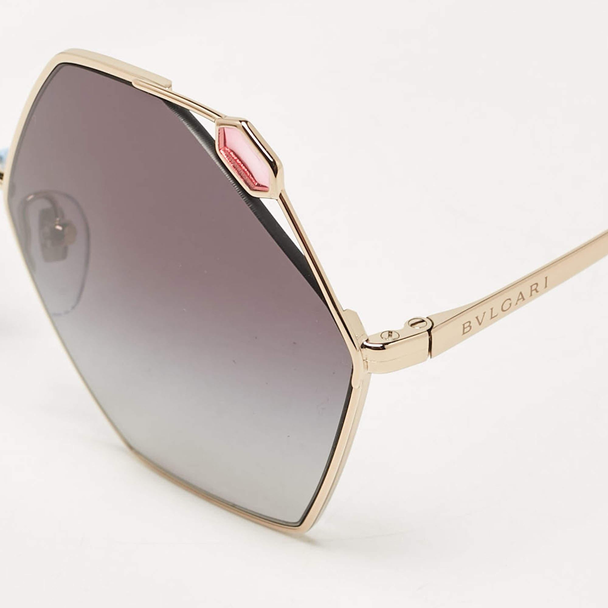 The stylish frame sculpted in metal into a gorgeous shape makes these sunglasses a high fashion accessory that you must own. From the house of Bvlgari they will look best with your daytime statement outfits.