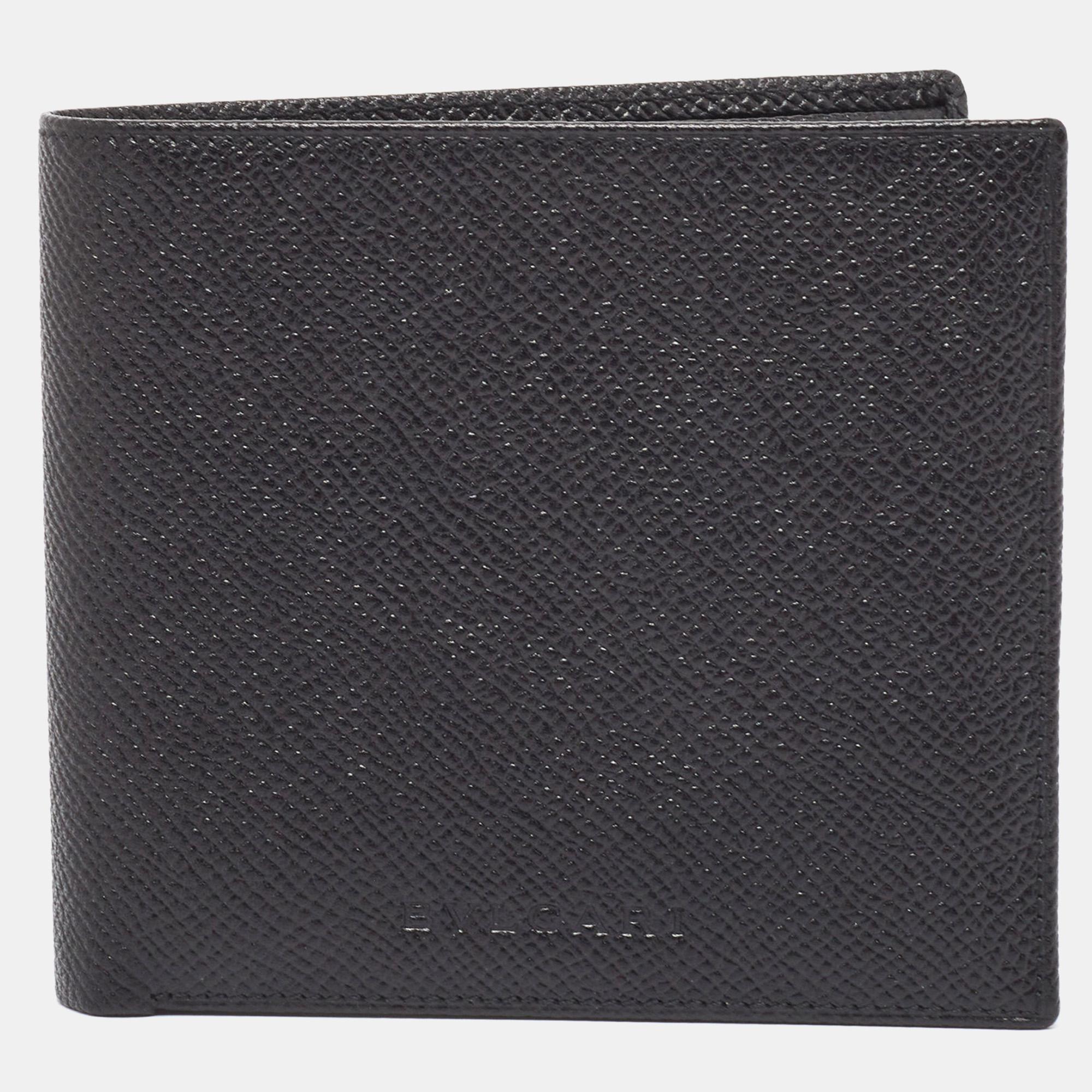 This wallet from Bvlgari brings along a touch of luxury and immense style. It comes crafted from leather and designed as a bifold with the logo on the front. It is equipped with compartments and multiple slots so you can neatly carry your cards and