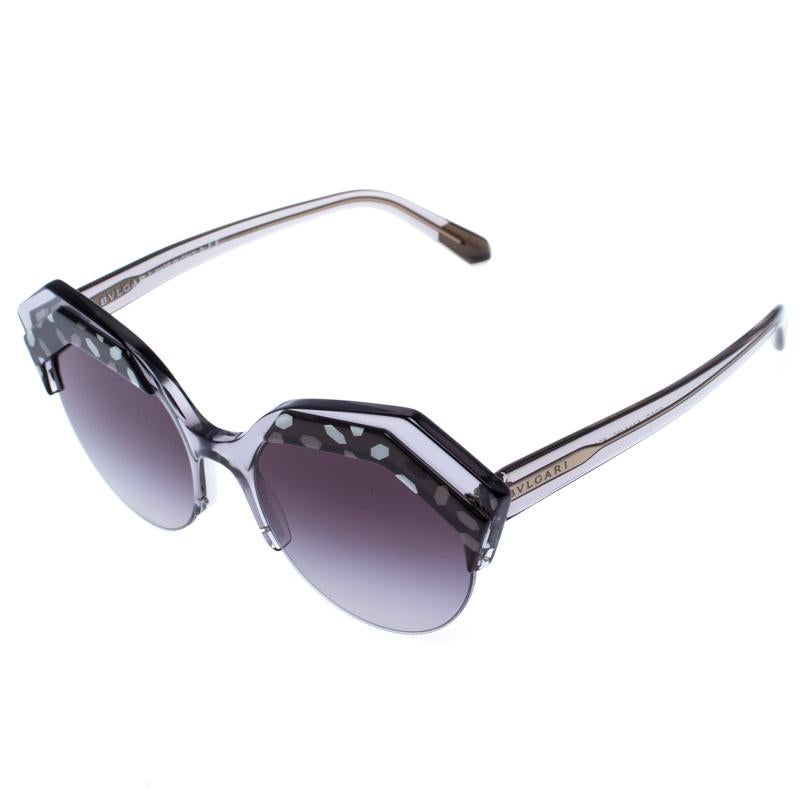 The stylish frames come from the house of Bvlgari and have been sculpted in acetate and gold-plated metal to form a round shape and feature Serpenti accents on the front. Make these sunglasses a high-fashion accessory that you must own. They come
