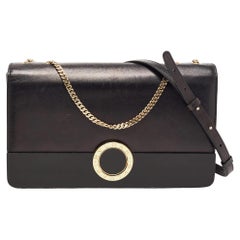 Bolso de hombro Bvlgari con solapa de piel negra y metacrilato