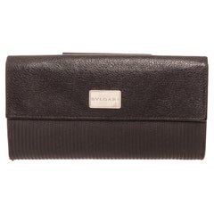 Bvlgari Black Leather Flap Wallet with gold-tone hardware, trim leather