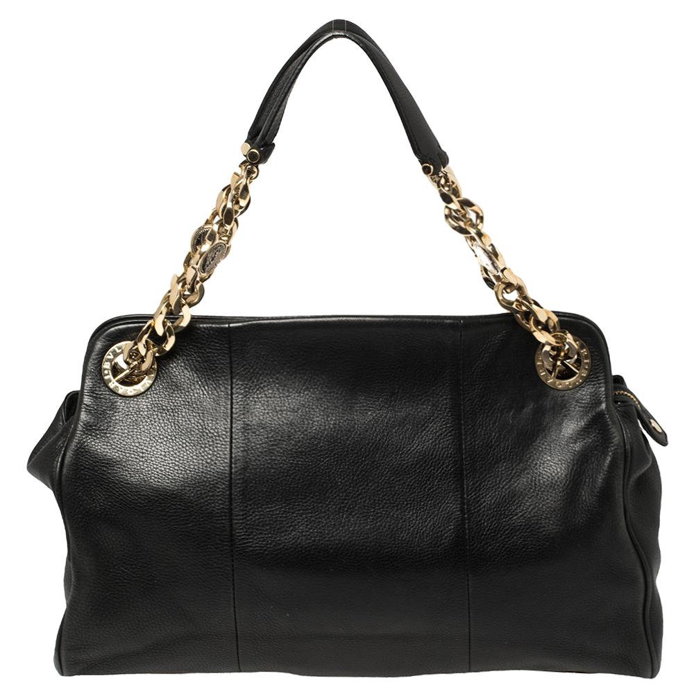 Handbags are more than just instruments to carry one's essentials. They tell a woman's sense of style and the better the bag, the more confidence she gets when she holds it. Crafted from leather, this Bvlgari bag is stylish and functional. It