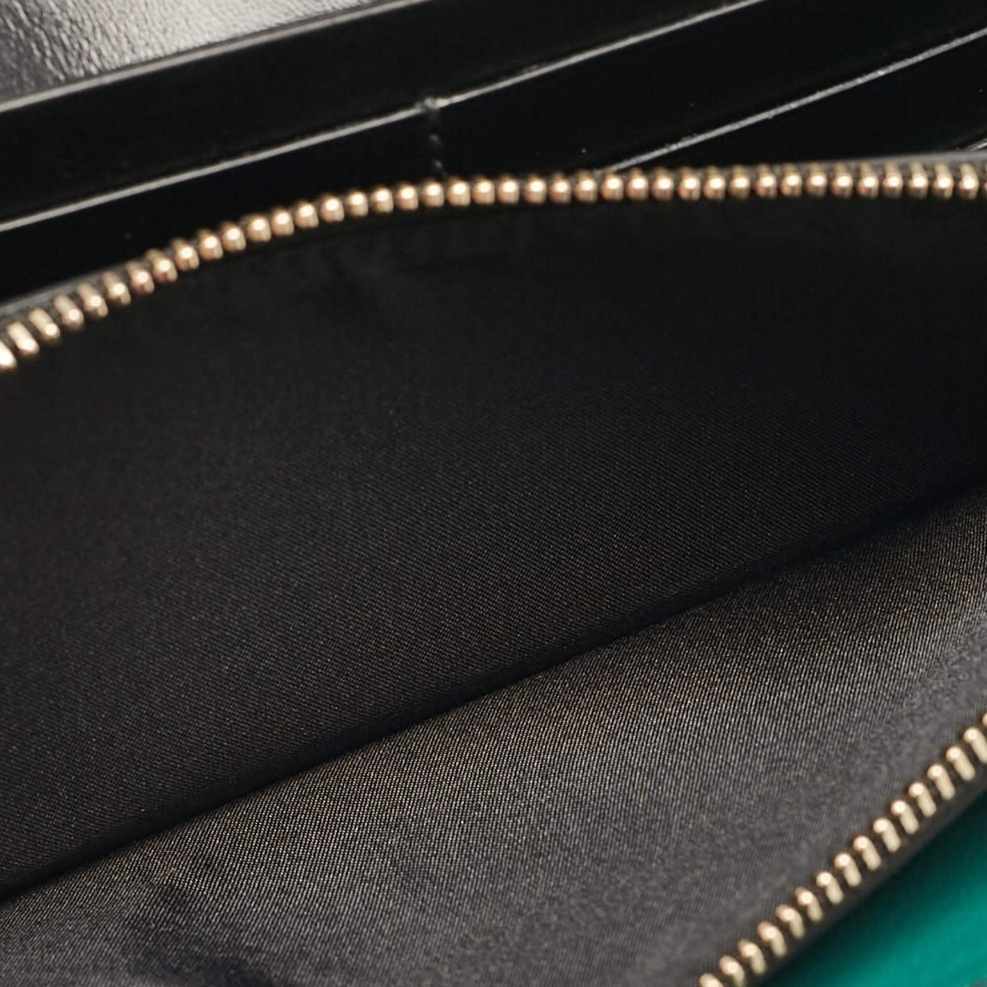 How lovely is this blue Bvlgari wallet Every accent on it is appealing and high in style  like the smooth leather exterior and the Serpent head on the front flap which opens to reveal multiple slots and a zip compartment.