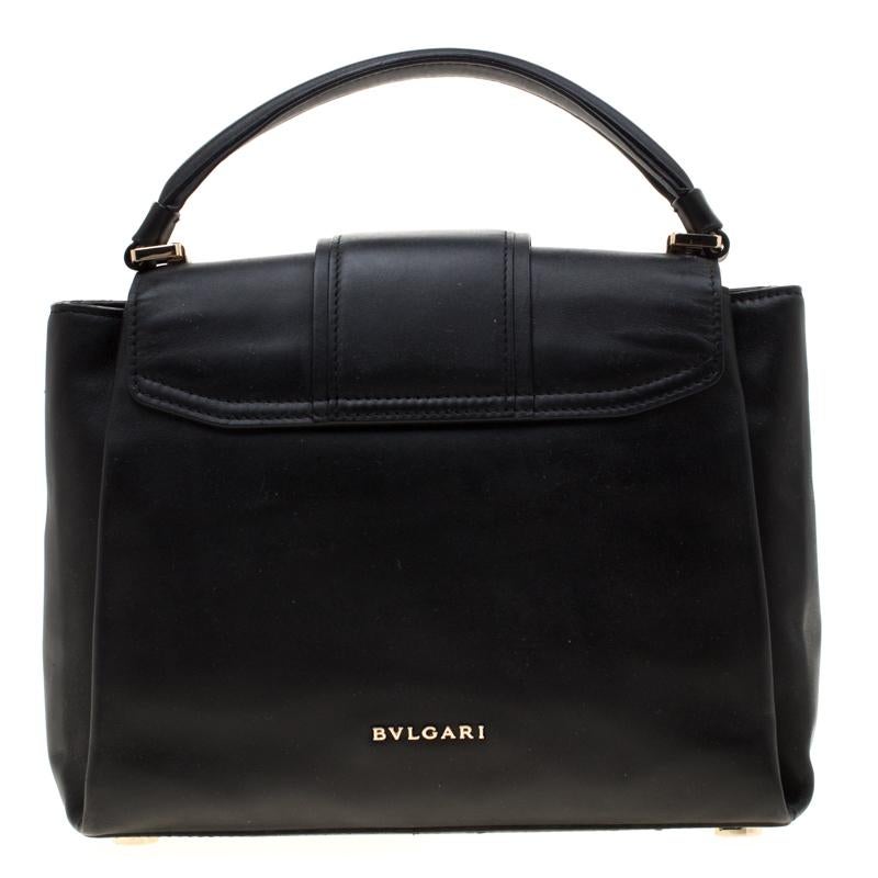 This beauty is from Bvlgari and it is a sight to behold! It is excellently crafted from leather and designed to make every handbag lover swoon. The bag holds a stunning enamel lock on the flap which has the brand's iconic 