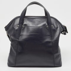 Cartera con cremallera de piel negra Bvlgari