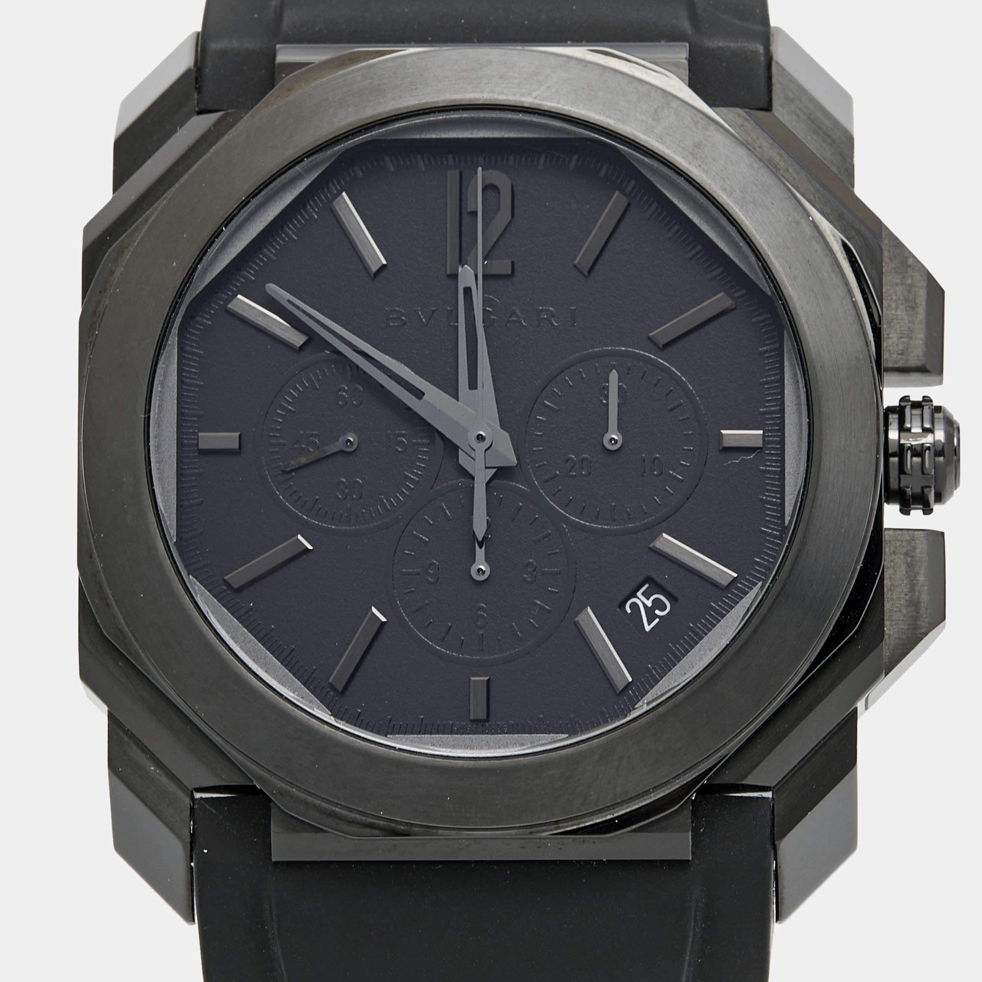 The Bvlgari Octo 103027 men's wristwatch exudes contemporary elegance. Its sleek octagonal case, crafted from durable stainless steel with a striking black PVD coating, harmonizes effortlessly with the supple rubber strap, resulting in a timepiece