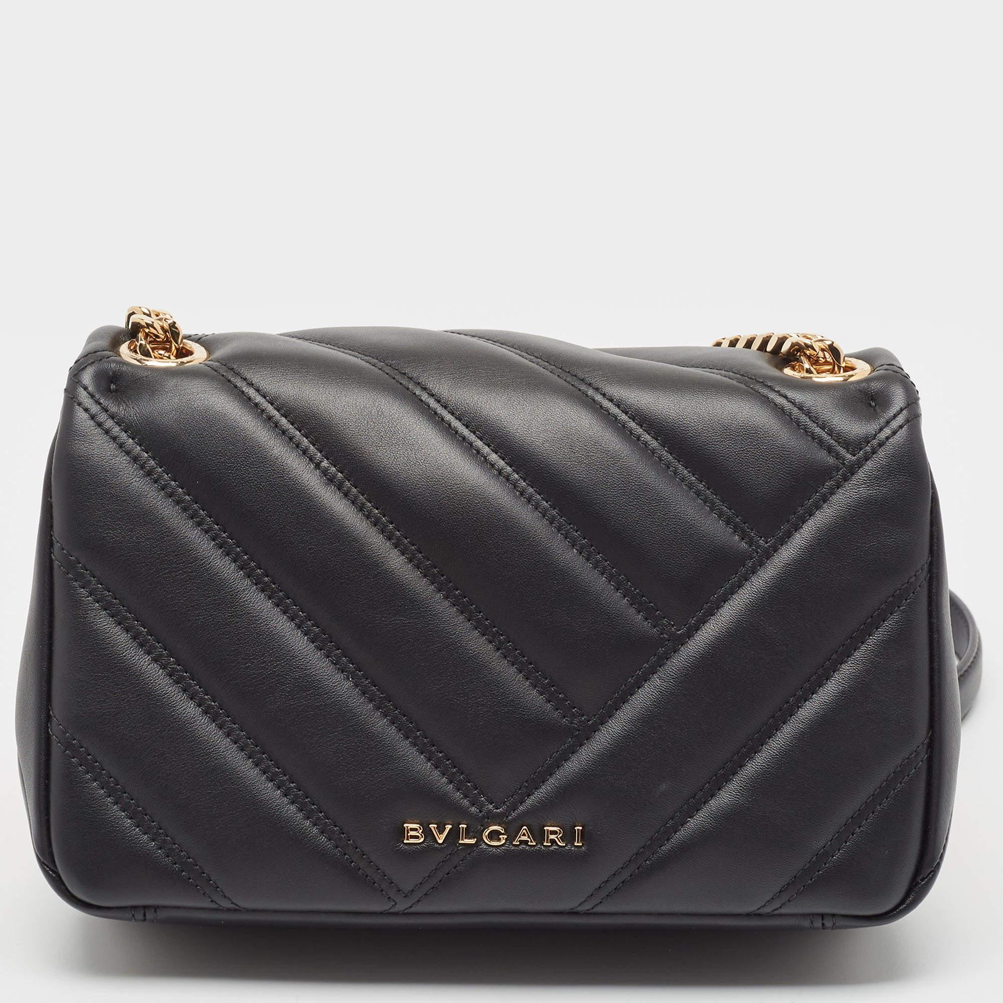 Structured, sophisticated, and stylish are some words that describe this Bvlgari shoulder bag! Crafted from the best quality material, the creation is adorned with the label's signature appeal and equipped with a well-spaced interior. Carry it to