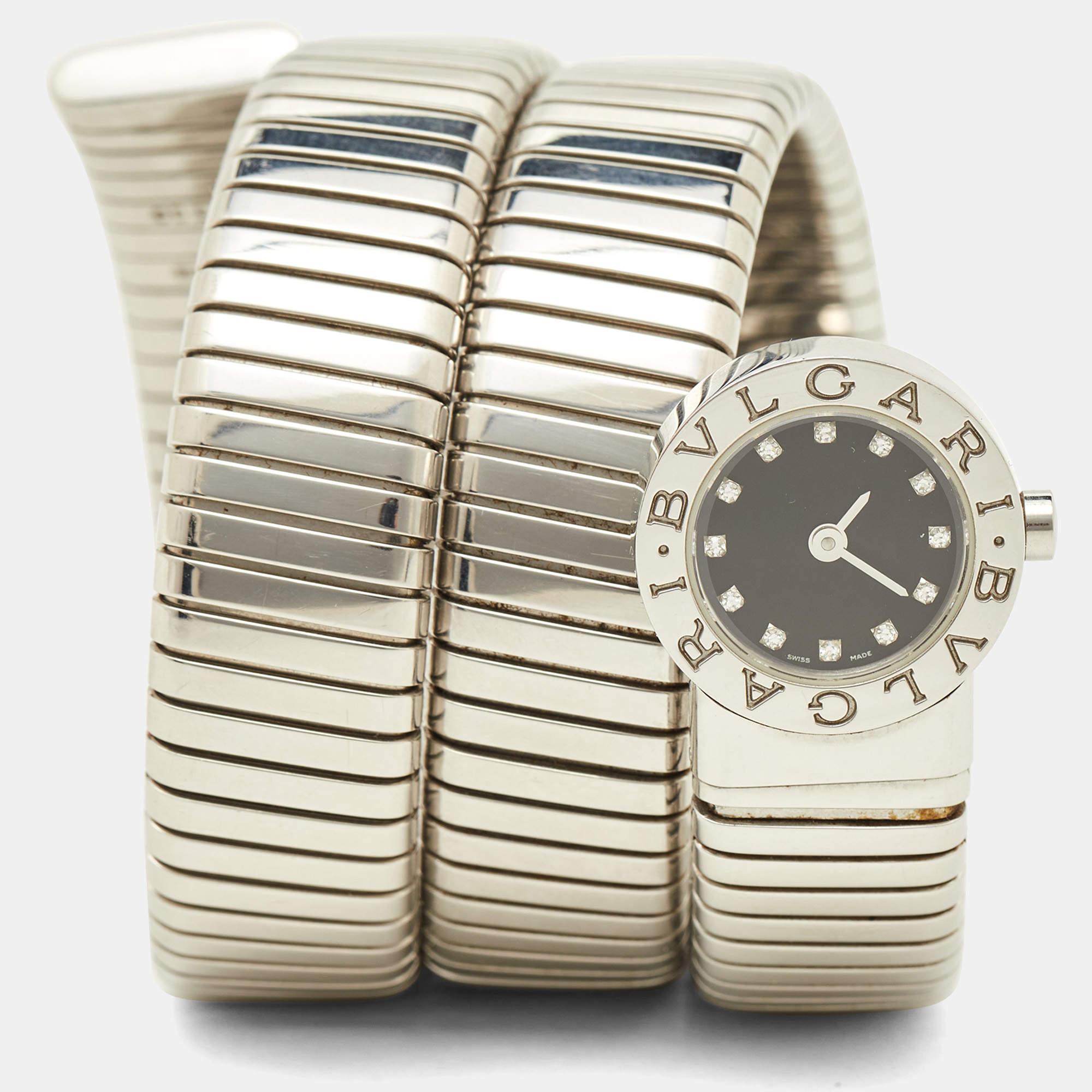 Exuding glamour and unique style, the Bvlgari wristwatch flaunts the brand's popular design: Tubogas. The stainless steel body, spiraled twice, features the fine lines of the Tubogas technique. Its black dial is equipped with diamond hour markers