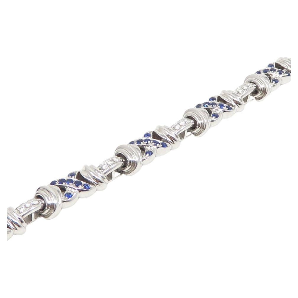 An iconic  BVLGARI blue sapphires and diamonds bracelet  0.8ct TW, most about G-H and VS range

Sapphires tested and are natural, approx 1.2ct TW

Bracelet 8mm wide, 7.25 inches long

Marked: Bulgari Italy 750

Total Weight : 32.5 grams

