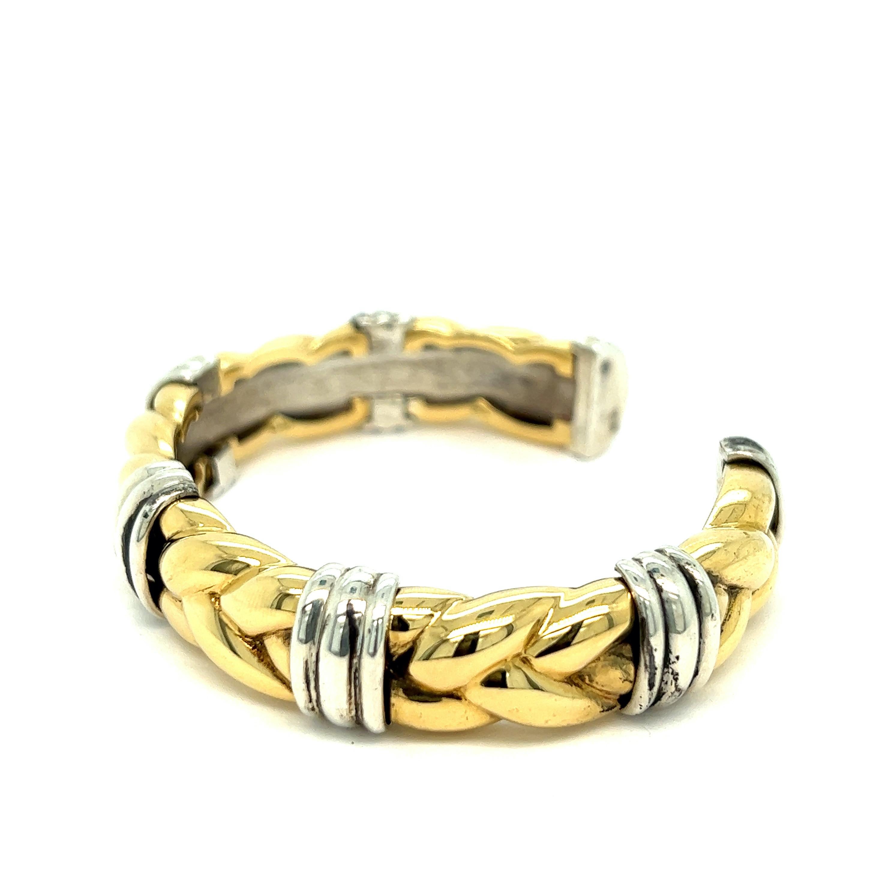 Bvlgari braided gold cuff bracelet

Braided design, 18 karat yellow gold and sterling silver; marked Bvlgari, 750, 925

Size: width 0.5 inch, inner circumference 6.25 inches, diameter 2 inches
Total weight: 57.0 grams