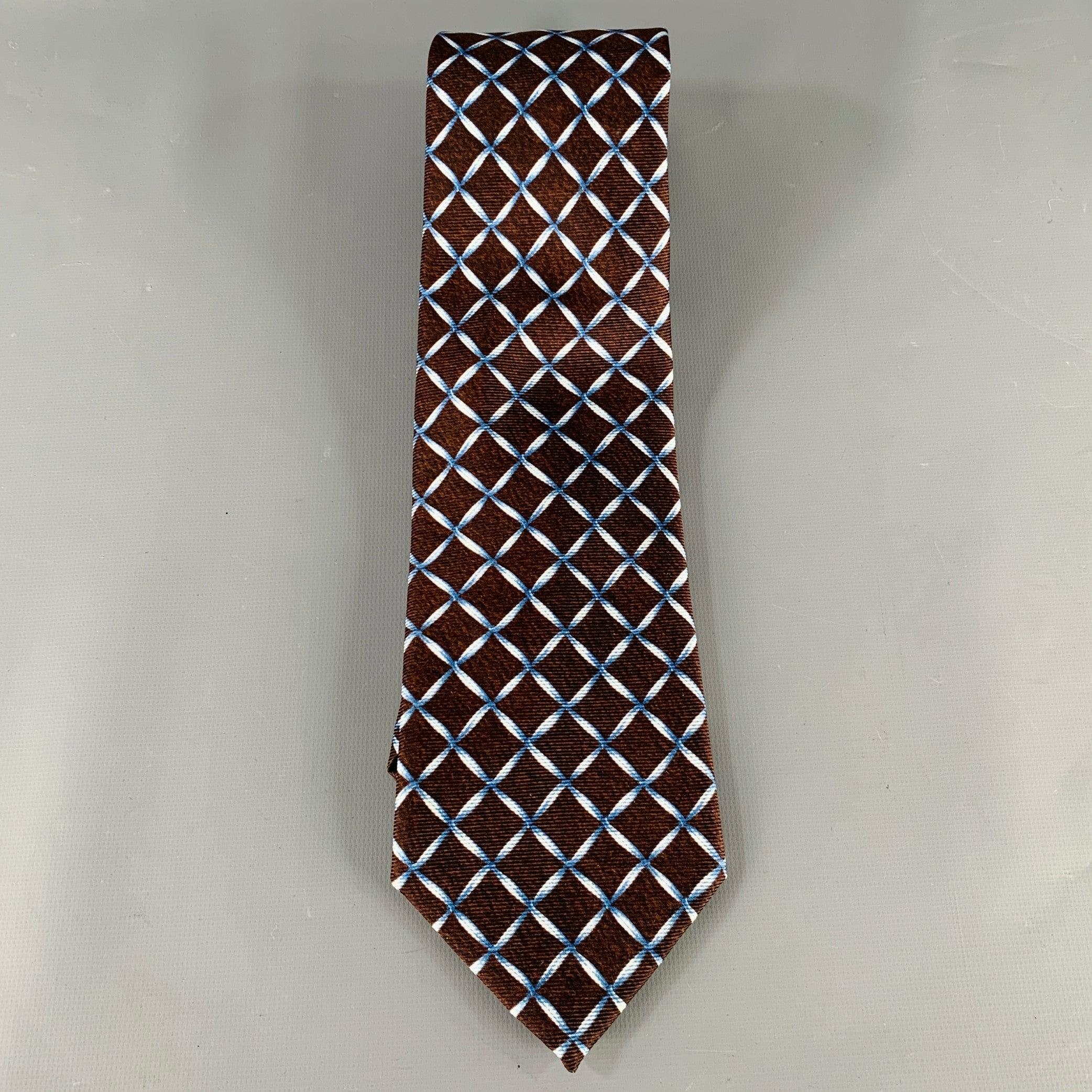 BVLGARI necktie
in a brown silk featuring a blue windowpane pattern. Made in Italy.Very Good Pre-Owned Condition. 

Measurements: 
  Width: 4 inches Length: 59 inches 
  
  
 
Sui Generis Reference: 135295
Category: Tie
More Details
    
Brand: 