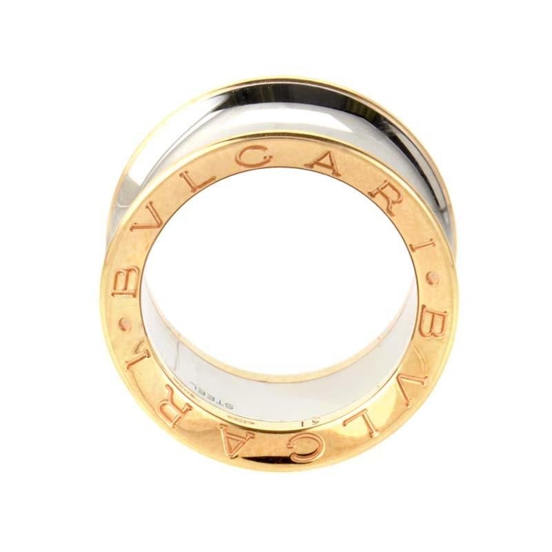 This band ring from Bvlgari's Bvlgari-Bvlgari collection is simple and refined. It is made of stainless steel and is accented with 18K rose gold. The rose gold is inscribed with the Bvlgari logo.
Ring Size: 6.0