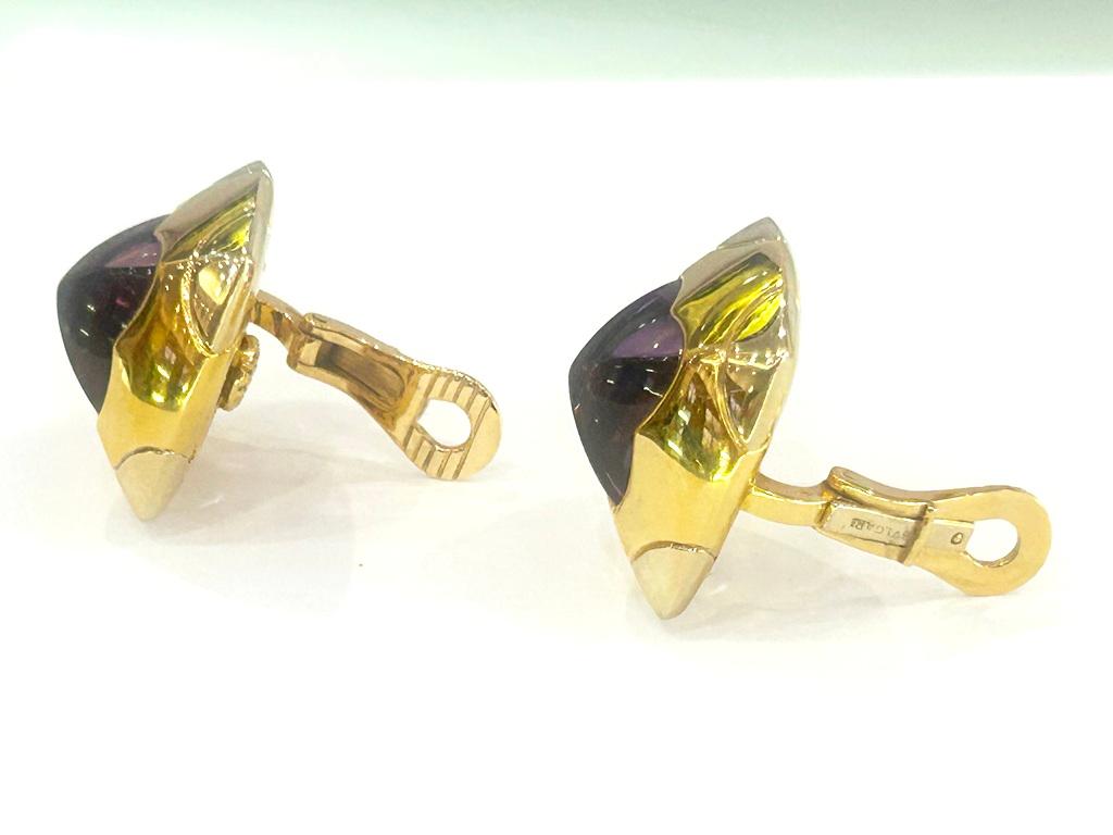 In the 2020's Bvlgari's story continues to combine legacy and innovaton.

Brand= Bvlgari
Amethyst= 2 Pyramid Shape Cabochons cut of African Amethyst gemstones
Weight= 30.45 Grams
Hallmark= Bvlgari 
