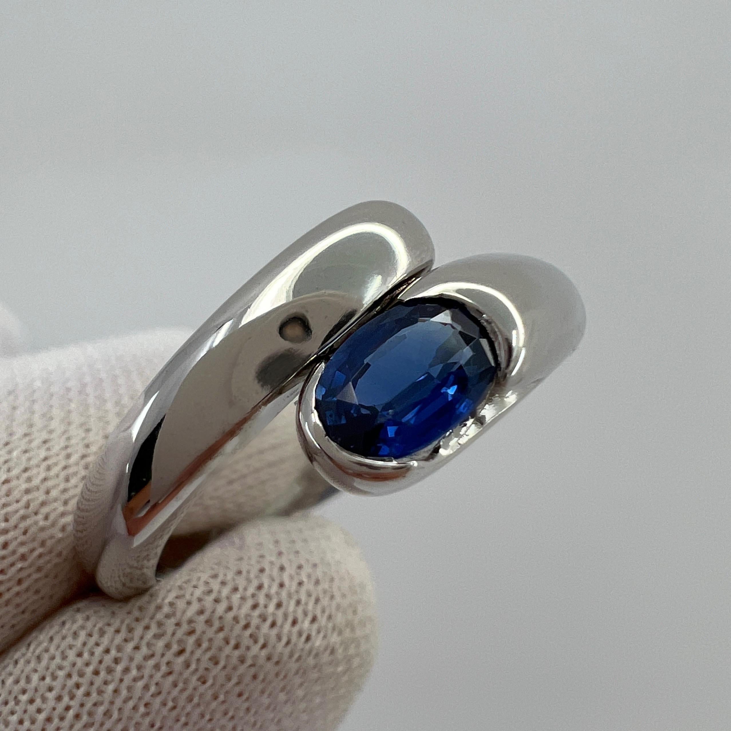 Bvlgari Astrea Blue Sapphire And Diamond Oval Cut 18k White Gold Ring.

The classic Bvlgari snake theme from the more modern Astrea line, this 18k white gold bypass ring wraps comfortably around the finger. 

The ring is set with a beautiful oval
