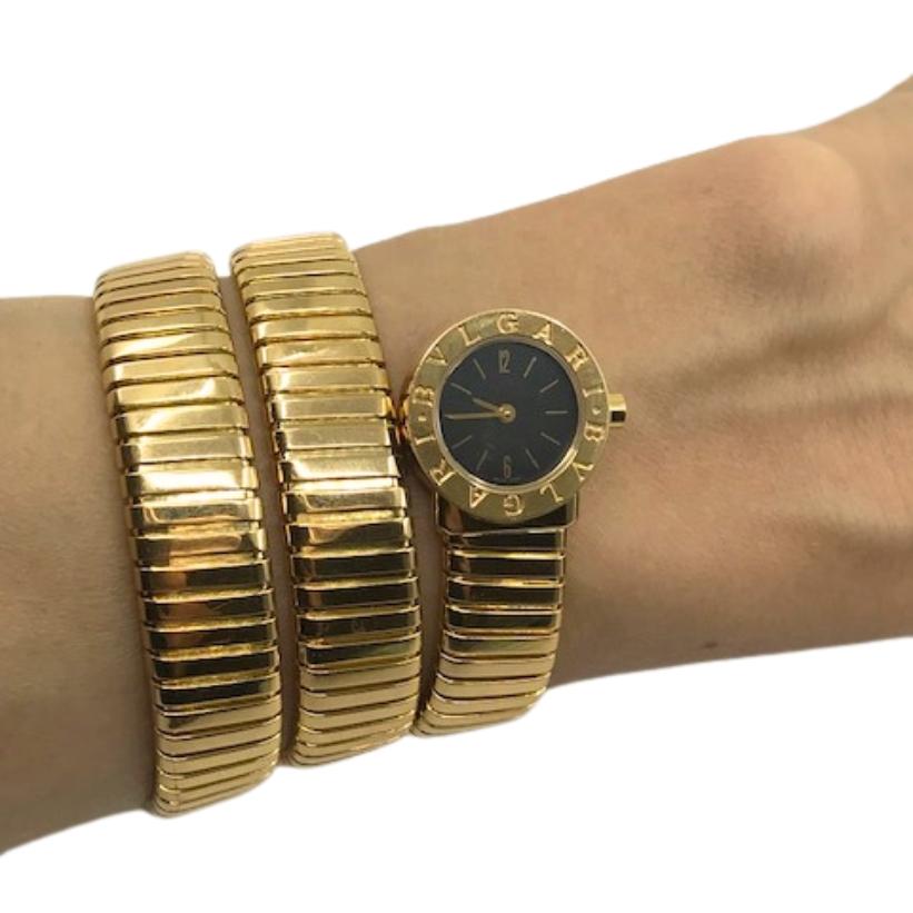 A Bulgari Tubogas 18k gold triple wrap-around watch, BB19 model (the case diameter is 19 mm).
An iconic piece that lately became a must-have among fashionistas all over the world. 

The case with a snap-on back is stamped with the maker's mark, a