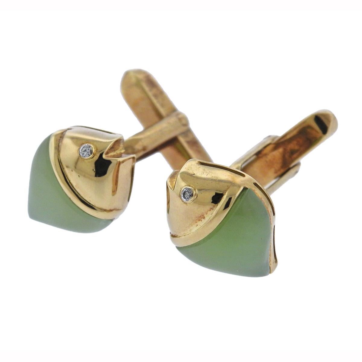 Pair of 18k yellow gold fish cufflinks by Bulgari, set with diamond eyes and chrysoprase. Cufflink top measures 15mm x 13mm and weigh 10.2 grams. Marked Bvlgari, 750.