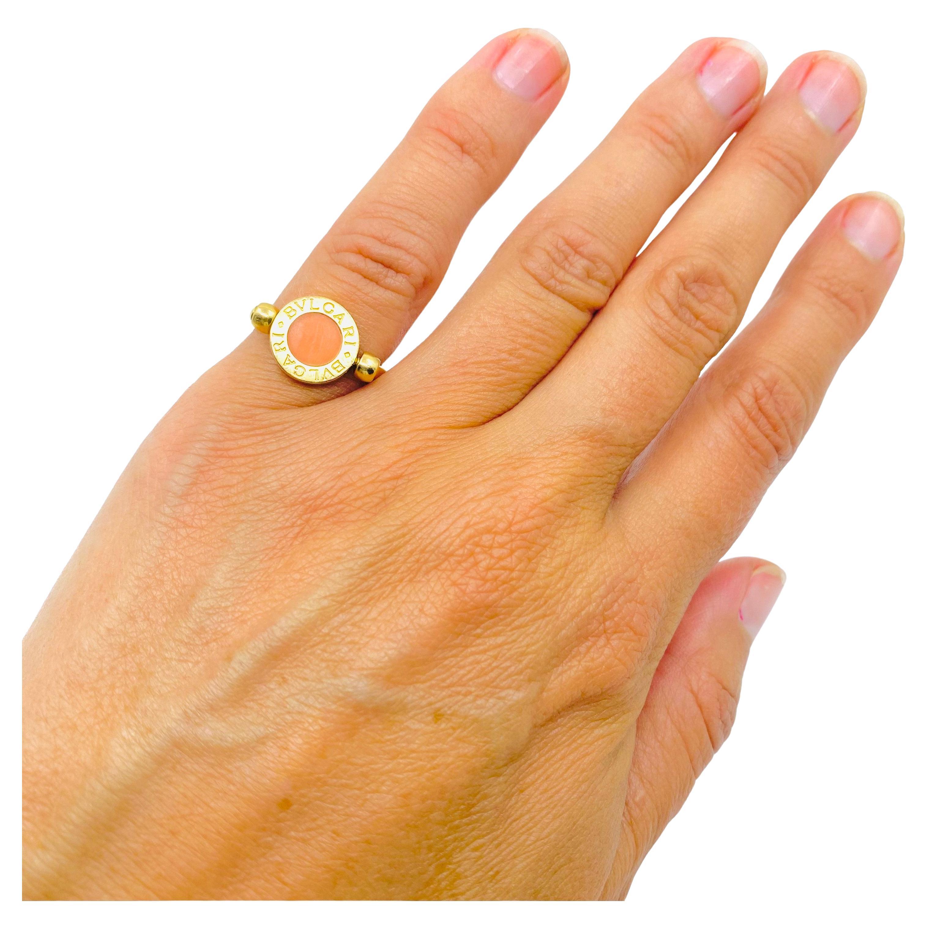 DESIGNER: Bulgari
CIRCA: 1990’s
MATERIALS: 18K Yellow Gold
GEMSTONE: Onyx
GEMSTONE 2: Coral
WEIGHT: 5.6 grams
RING SIZE: 4.5
HALLMARKS: BVLGARI, Madi in Italy, 750

A fun and playful Bulgari flip ring, made of 18k gold, featuring coral and