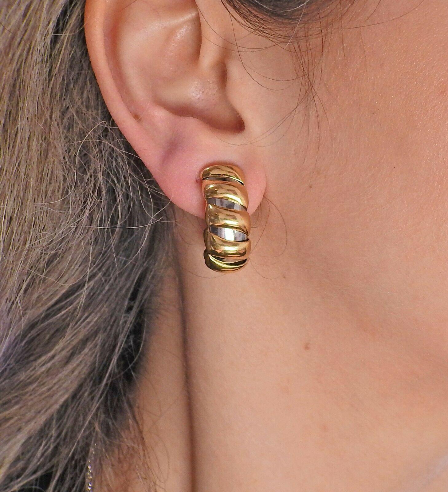 18k gold & steel hoop earrings by Bvlgari. Earrings are 26mm x 11mm. Marked - M, Bvlgari, 2337AL. Weight - 30.9 grams.

