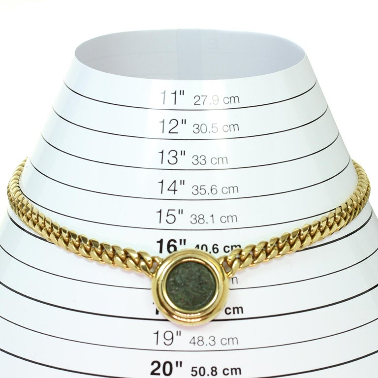 Buy Roman gold earrings with shield