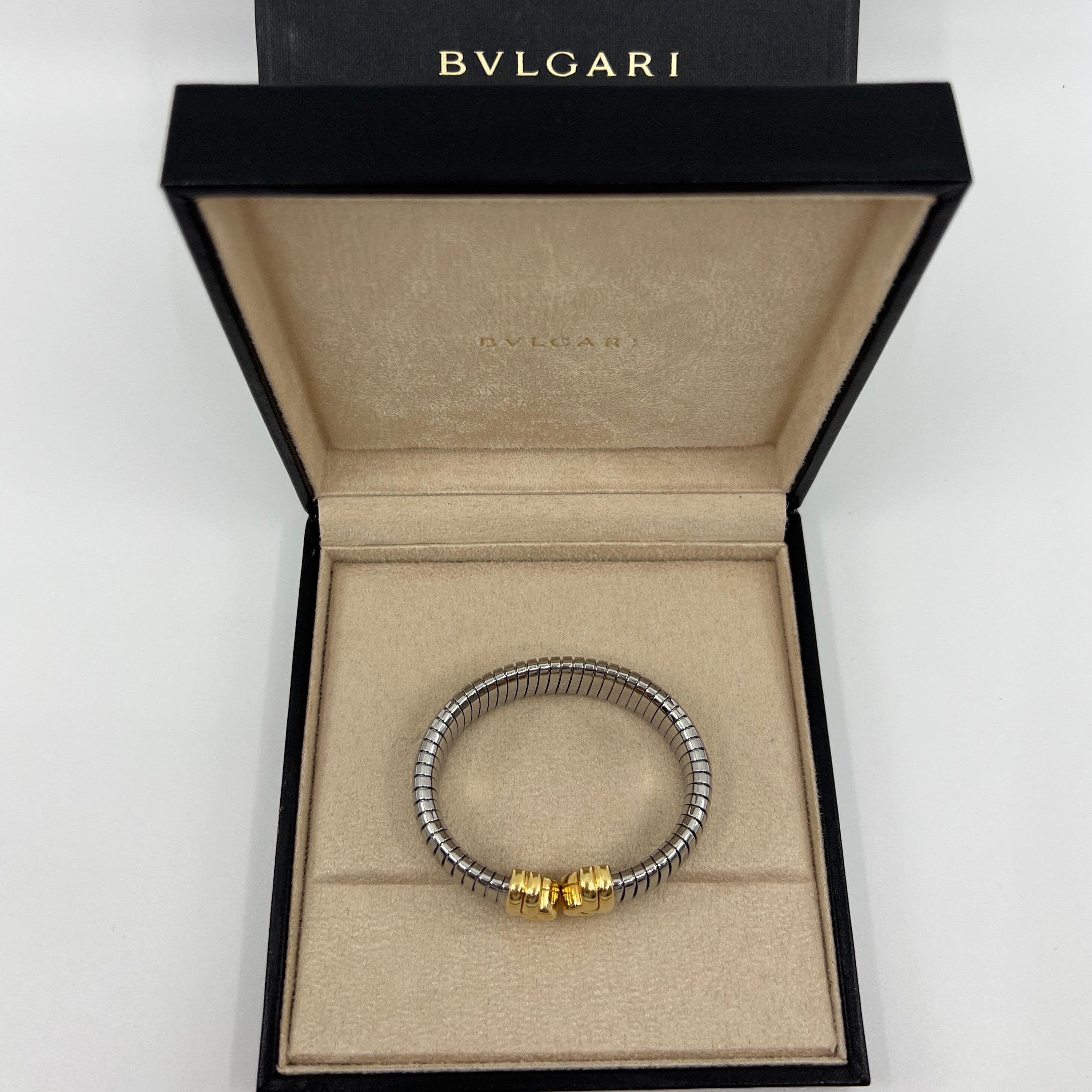 Bvlgari Parentesi Tubogas Bracelet Cuff 18k Yellow Gold & Stainless Steel.

Stunning Bvlgari bracelet cuff with signature Parentesi Tubogas style. Stainless steel flexible body of the bracelet and 18k yellow gold ends.
Fully hallmarked with Bvlgari
