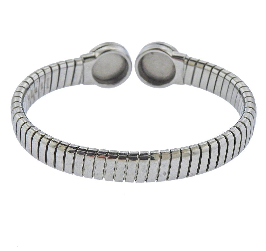 Stainless Steel Onyx bracelet by Bvlgari. Will comfortably fit 6.75