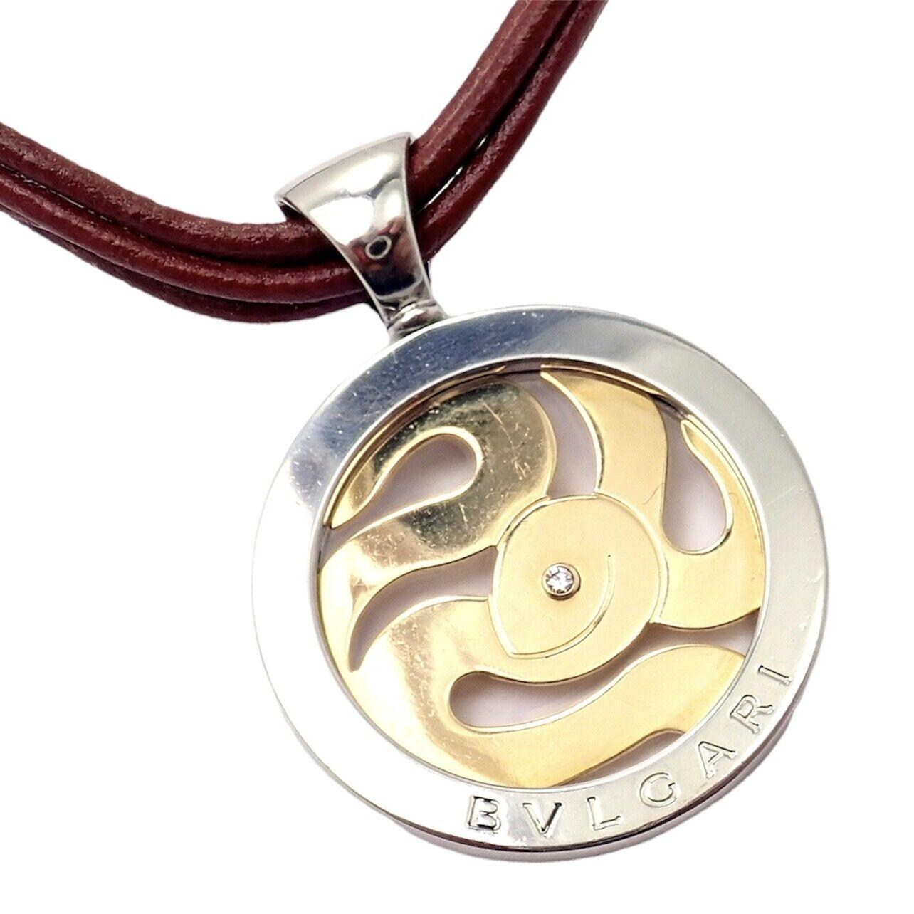 18k yellow gold and stainless steel diamond Tondo Snake pendant necklace by Bulgari.
With 1 round brilliant cut diamond total weight approximately 0.05ct
Details:
Pendant: 18k Yellow Gold And Stainless Steel
Necklace: 5 leather strand, burgundy