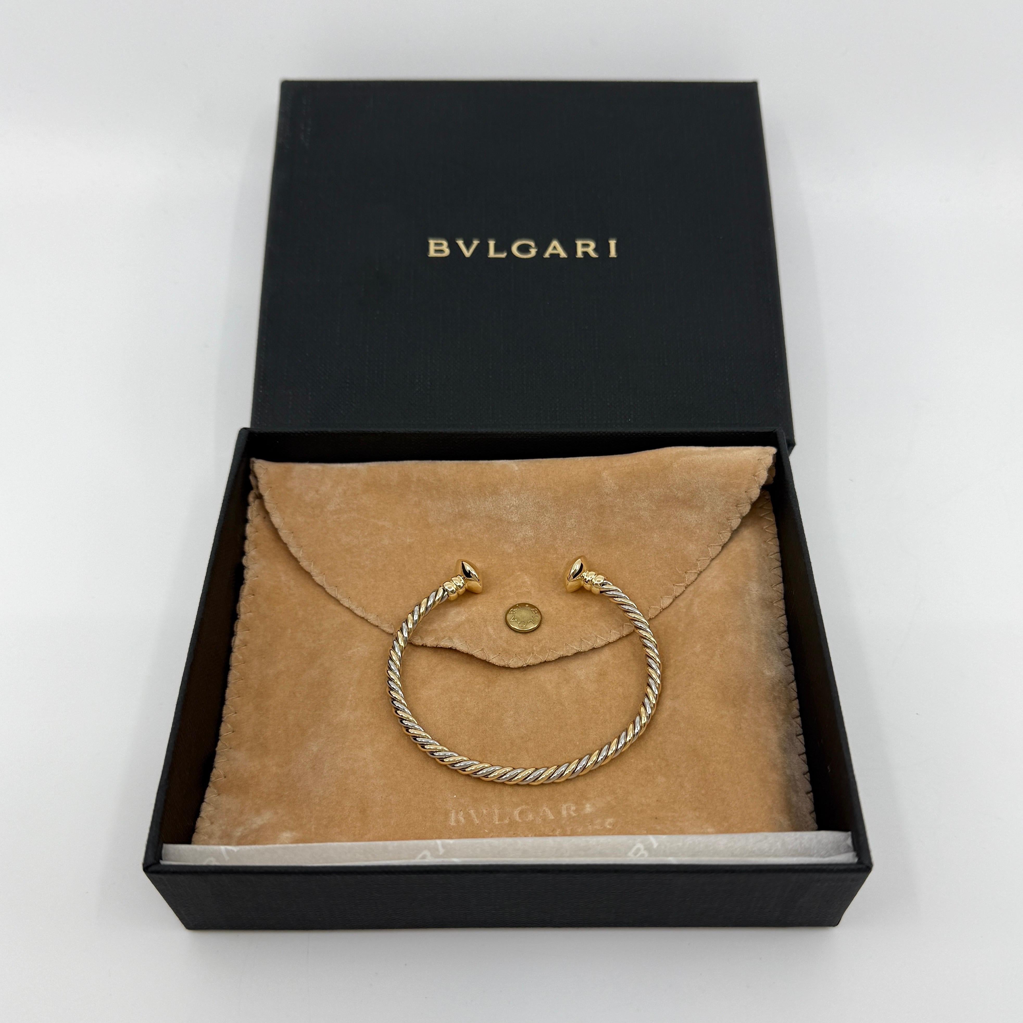 Rare Vintage Bvlgari Parentesi Tubogas Bracelet Twist Cuff 18k Yellow Gold & Stainless Steel.

Stunning Bvlgari bracelet cuff with signature Tubogas style. 18k yellow gold and stainless steel twist design with 18k gold ends. Highly polished and