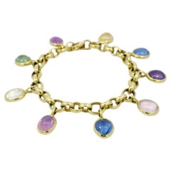 Bvlgari Bulgari Pulsera vintage con colgante de zafiro multicolor en oro amarillo de 18 quilates