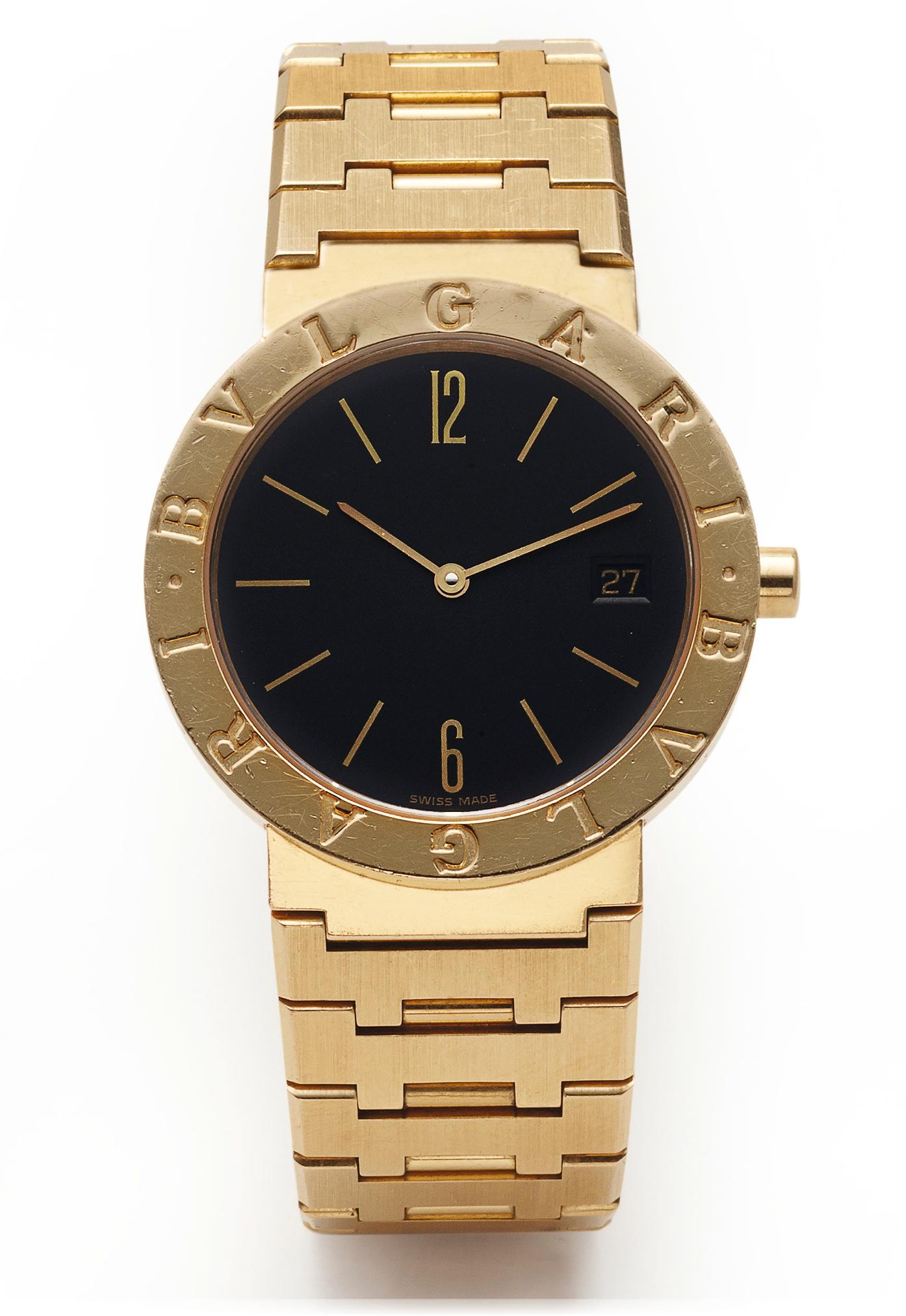 Bulgari Ref. BB 33 GGD P.89968. Made in the 1990s. Fine, 18K yellow gold mid size quartz wristwatch with date and an integrated 18K yellow gold Bulgari link bracelet with deployant clasp. Two-body, polished and brushed, bezel engraved with