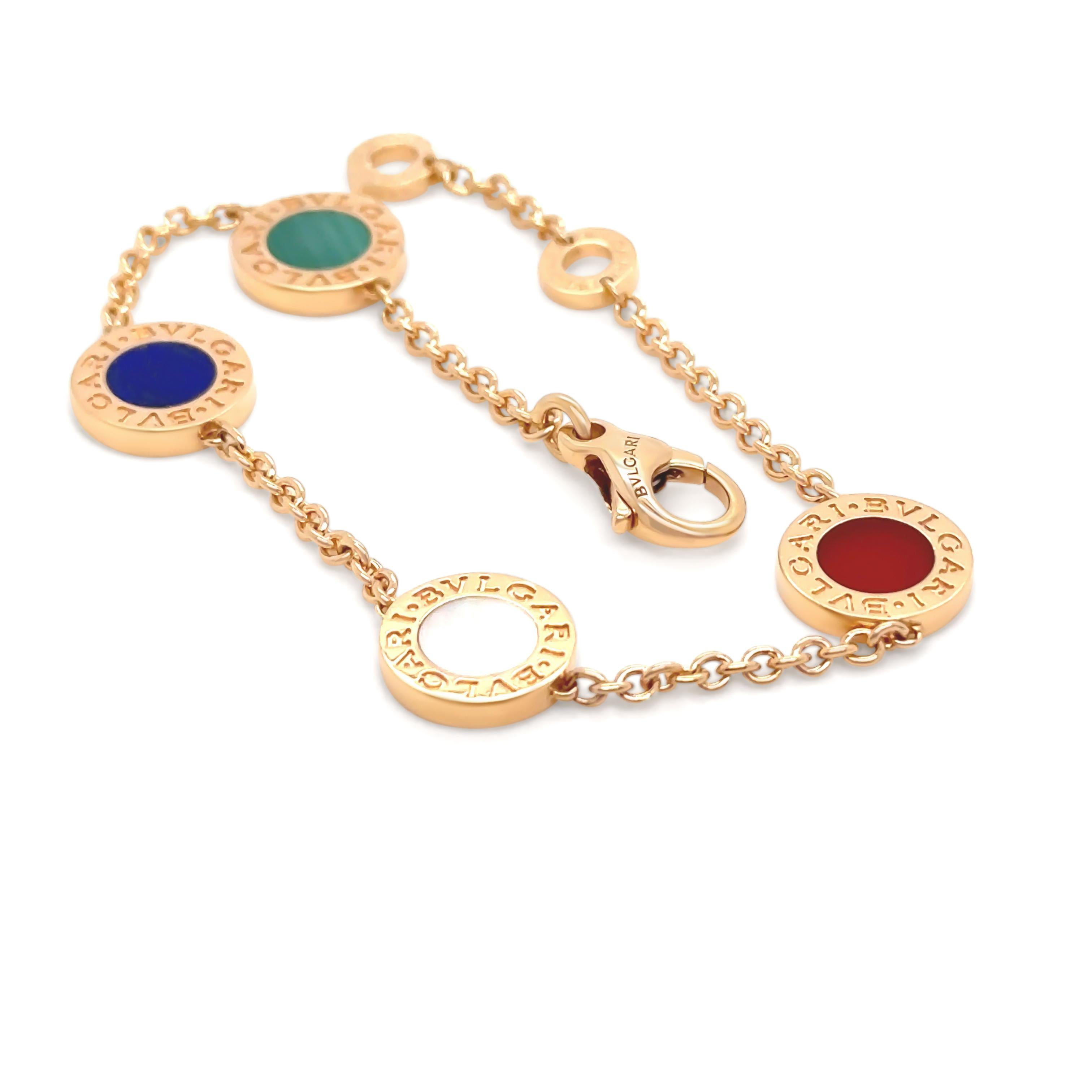 This exquisite Bvlgari Bvlgari bracelet is crafted in 18ct rose gold with a total weight of 11 grams. Featuring an elegant array of multicoloured gemstone elements, including carnelian, lapis lazuli, malachite, and mother-of-pearl, the bracelet