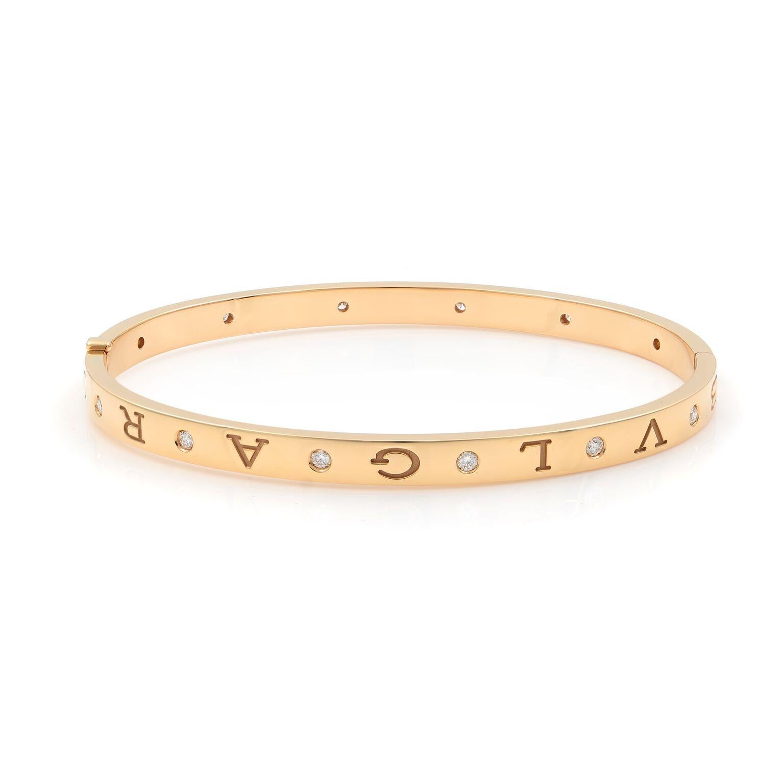 A classic BVLGARI BVLGARI 18 kt rose gold bangle bracelet set with 12 round cut diamonds totaling 0.47 cts. This bracelet is an effervescent, contemporary statement of classiness. Made in Italy. 
Condition: new without tags. Comes with box and