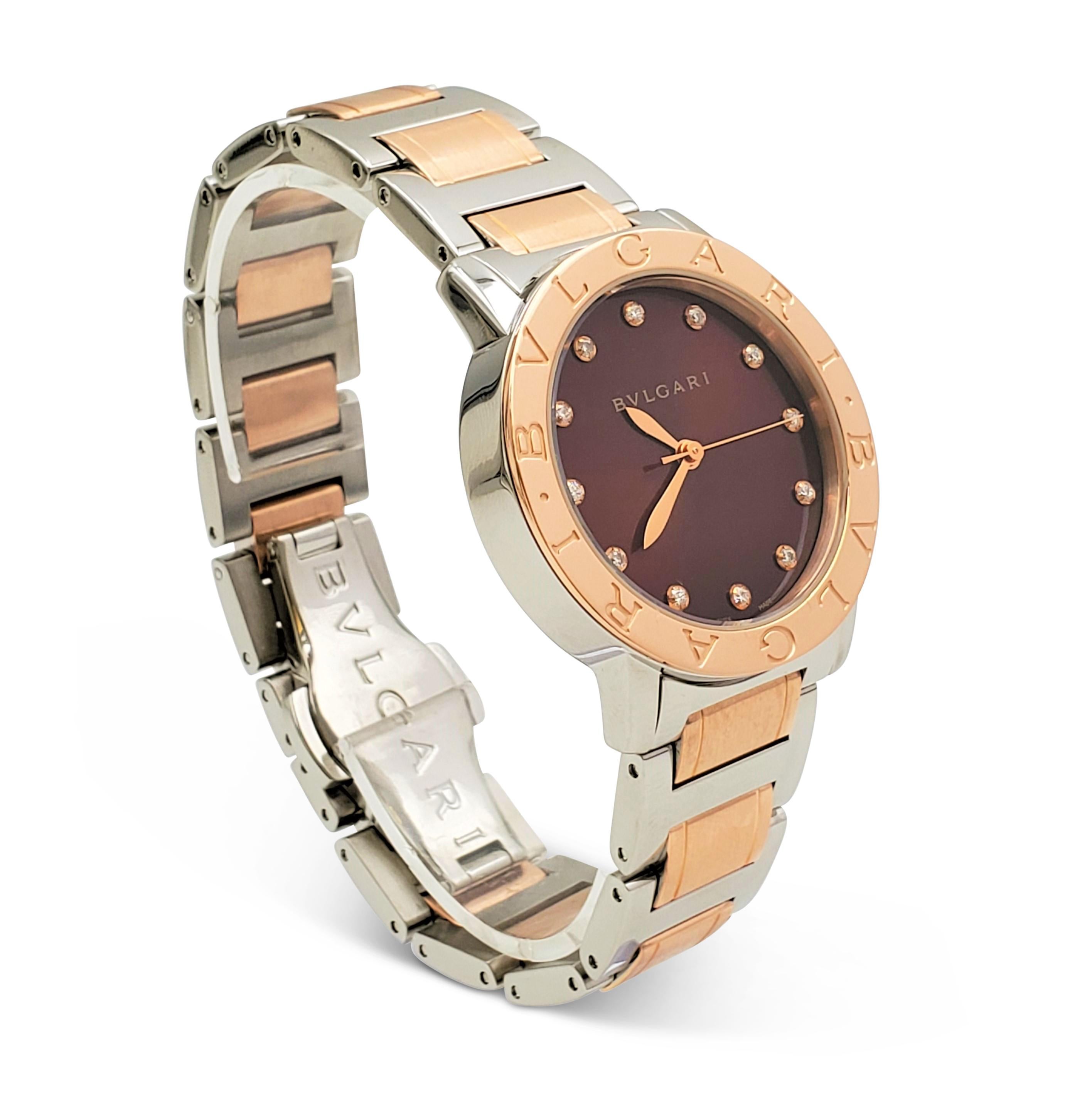 Authentic Bvlgari watch features a stainless steel case with two-tone stainless steel and 18 karat rose gold bracelet. The fixed rose gold bezel is engraved with the iconic BVLGARI-BVLGARI logo. The brown lacquered dial is completed with rose