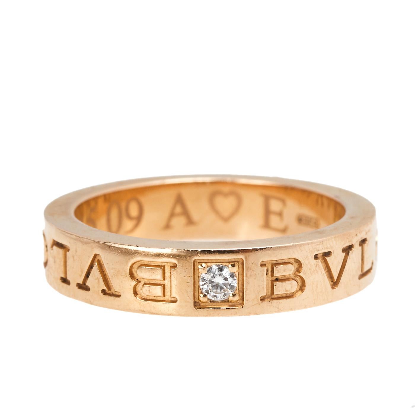 Well-crafted jewelry like this ring exudes creativity and style. This Bvlgari piece has been beautifully sculpted from 18k rose gold in Italy and detailed with the brand's logo meticulously engraved around it. The neat engravings are joined in