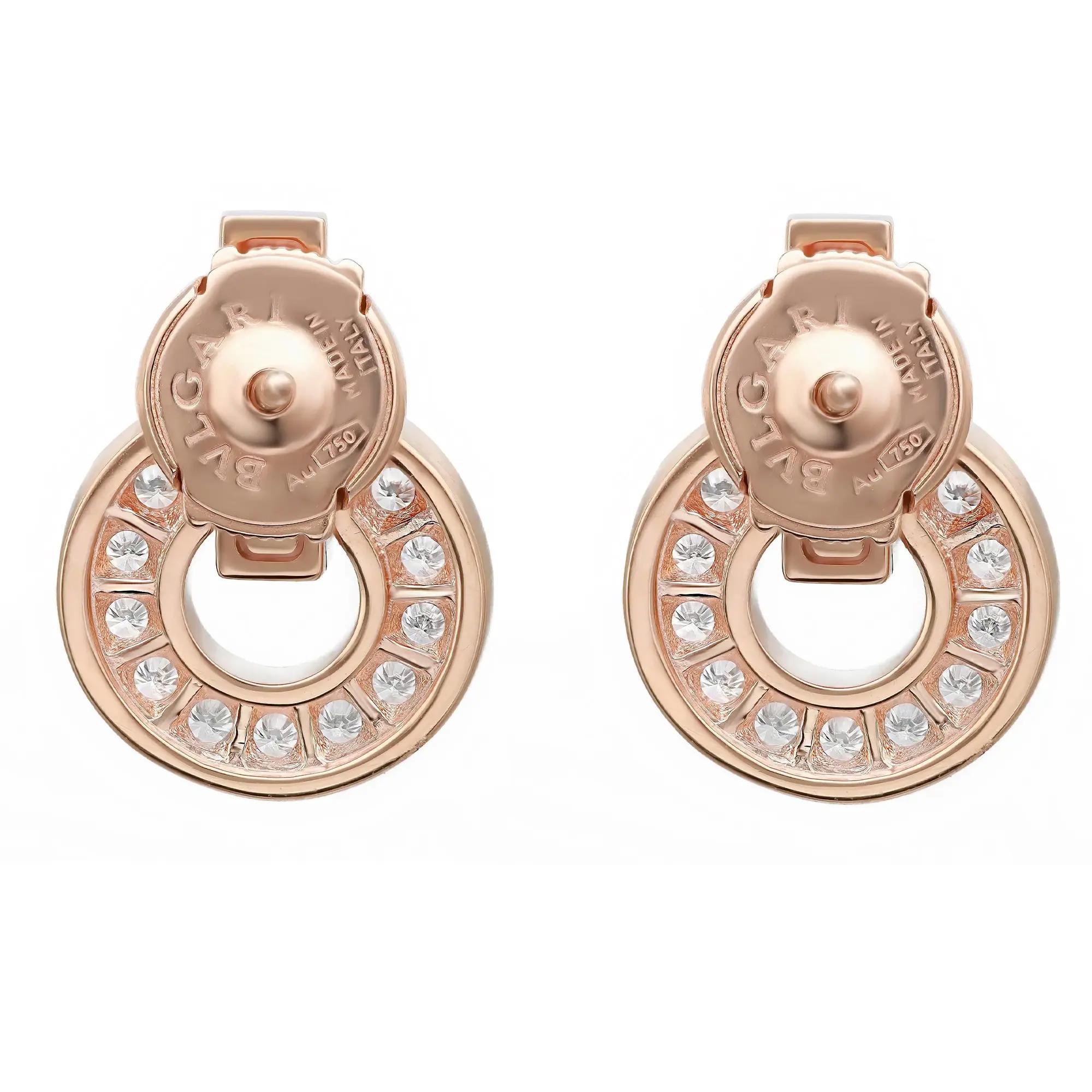 Beautiful and contemporary statement of sophistication, these Bvlgari Bvlgari diamond earrings are crafted in lustrous 18K rose gold. It features a Bvlgari logo engraved earring top attached to an iconic circular motif with an openwork design
