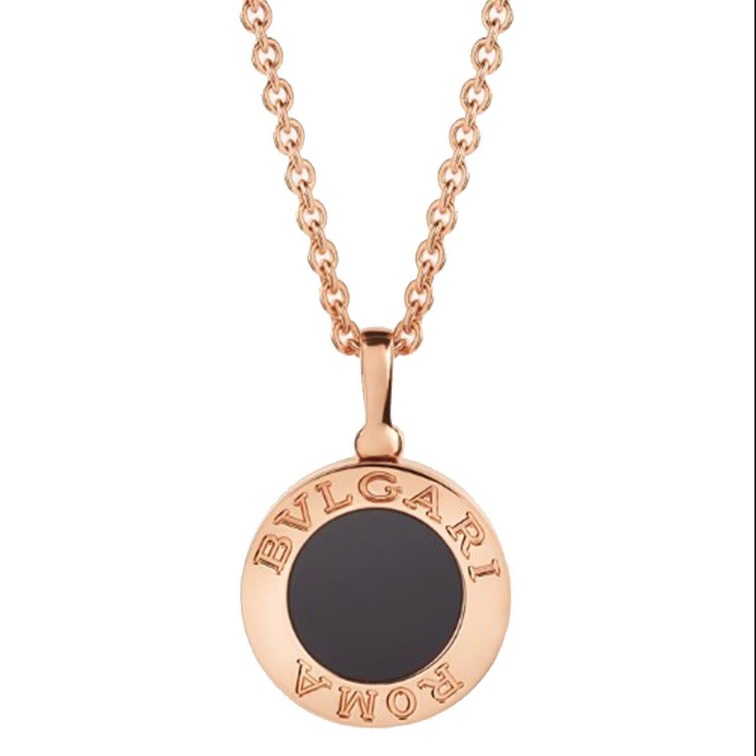Designer: Bvlgari

Collection: Bvlgari Bvlgari 

REF: 310815

Style: Double Sided Pendant Necklace

Metal: Rose Gold

Metal Purity: 18K

Necklace Length: 16.14-16.92 inches 

Stones: Diamond ; Onyx 

​​​​​​​Total Carat Weight :0.34