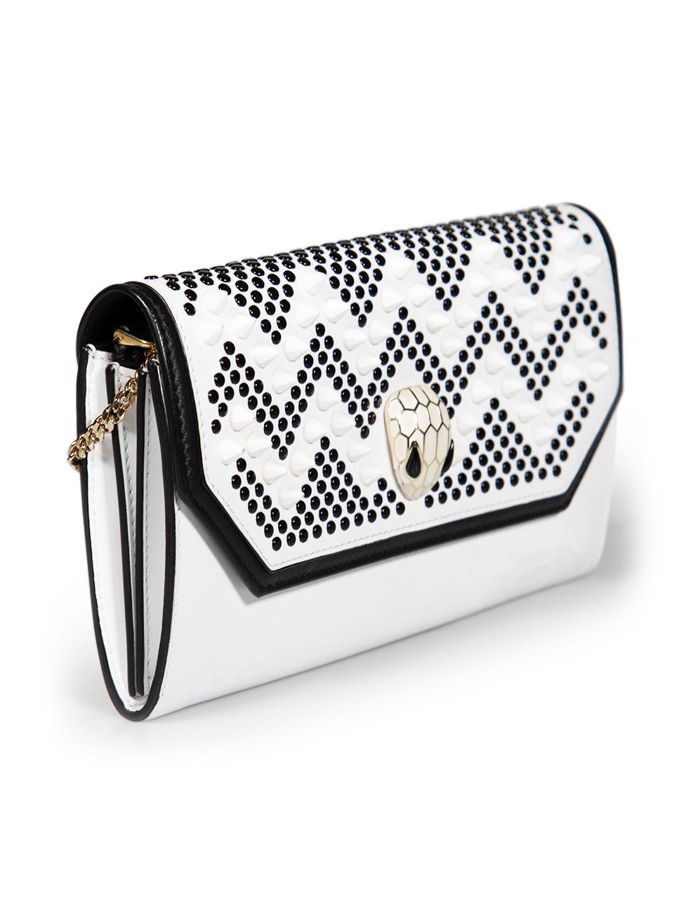 CONDITION is Good. Minor wear to the bag is evident. Light discolouration to the bottom front and rear. Small scratches to the front studs, front leather, rear and both internal compartments on this used Bvlgari x Nicholas Kirkwood designer resale