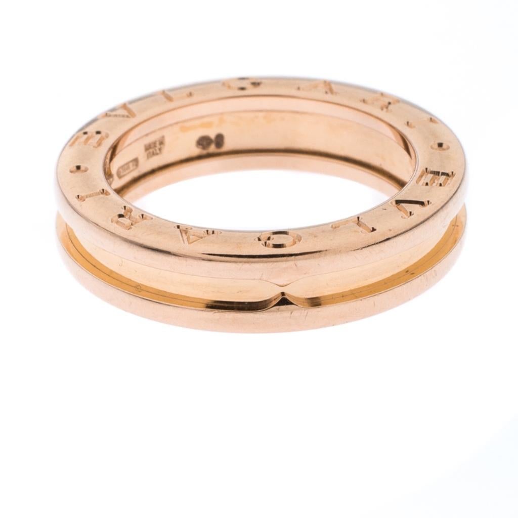 For the woman who has a refined taste in fine jewellery, Bvlgari brings her this immaculately crafted ring that has been made to be praised. The ring has a minimal style of one slender band in 18k rose gold surrounded by two logo-engraved outer