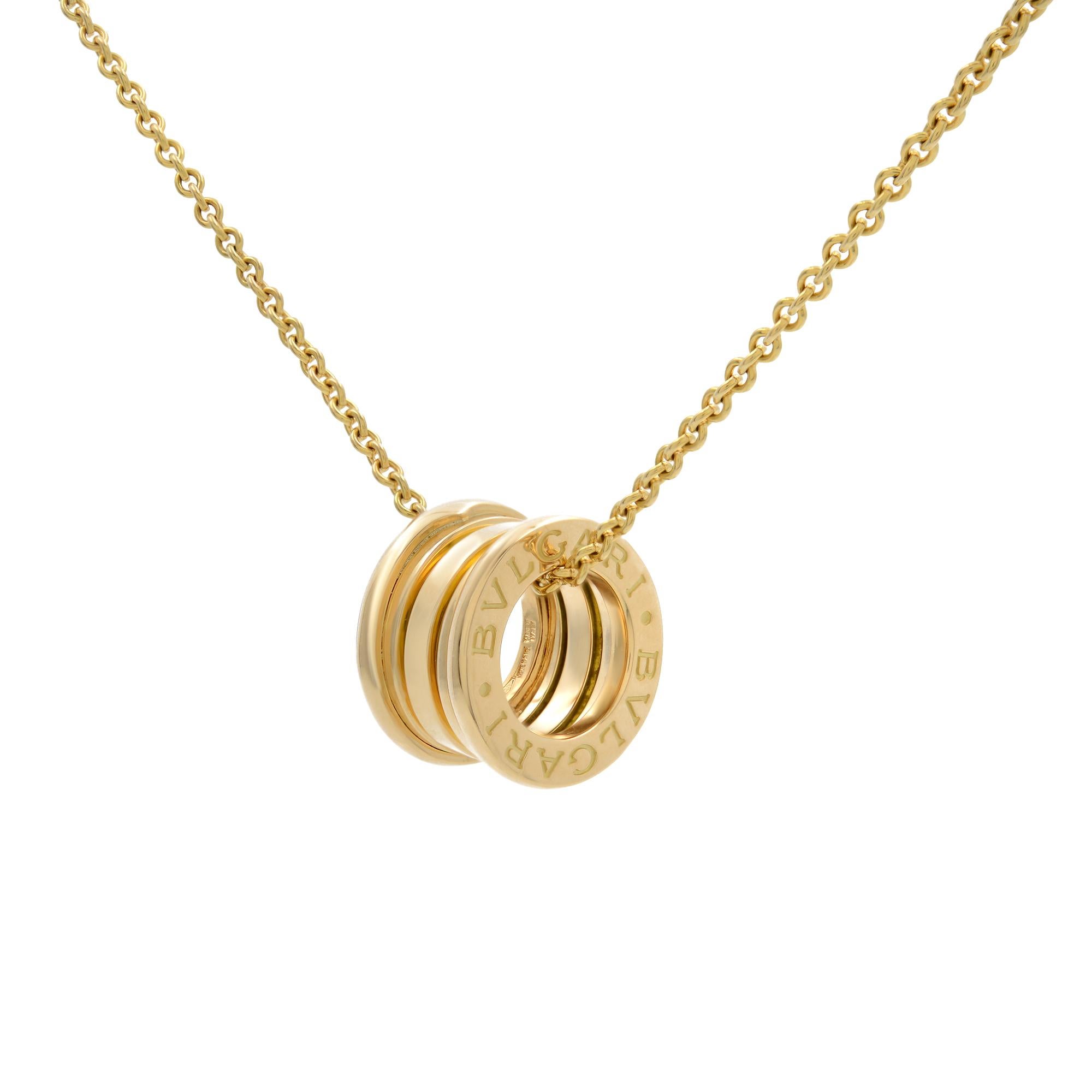 Bvlgari minimalist yet classy and elegant necklace from B.Zero 1 collection.  Crafted in 18k yellow gold, it flaunts the iconic  ring as the pendant. A delicate piece of jewelry that accents almost every outfit with grace and panache and is a