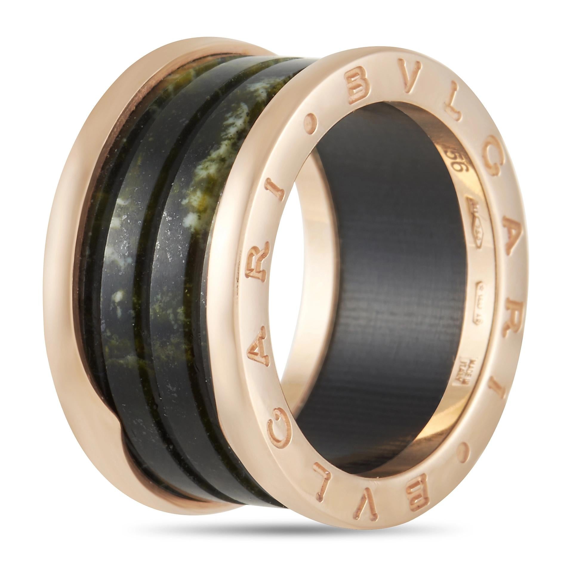 This Bvlgari B.Zero band ring is a confident, showstopping style that is destined make a statement. The 11mm wide band beautifully juxtaposes 18K Rose Gold with Green Marble to create a style that is anything but ordinary. The luxury brand’s