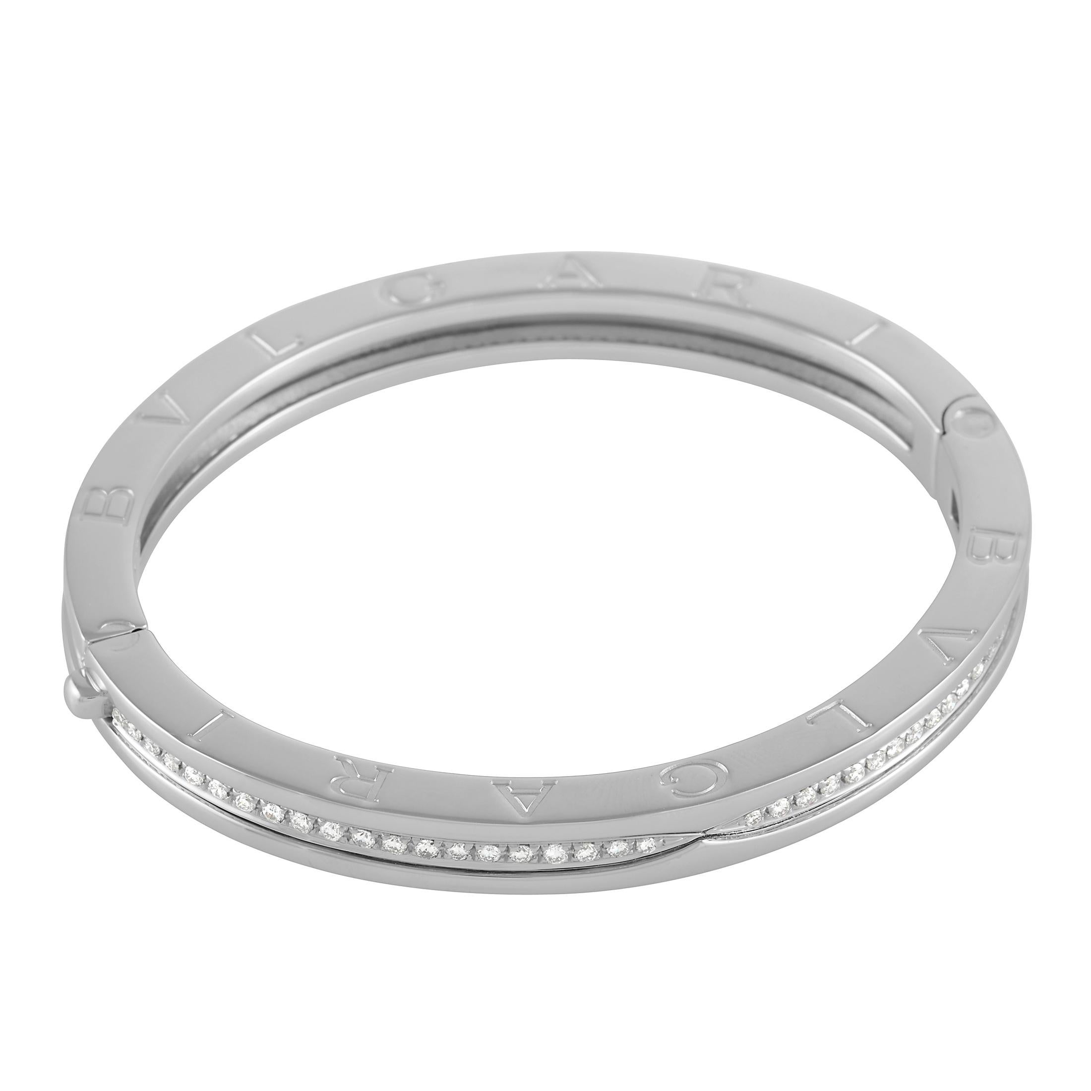 A sleek profile and a timeless sense of style make this Bvlgari B Zero bracelet simply sensational. This elegant bangle radiates light thanks to the series of diamonds totaling 1.52 carats with F color and VVS clarity. You’ll also find the luxury