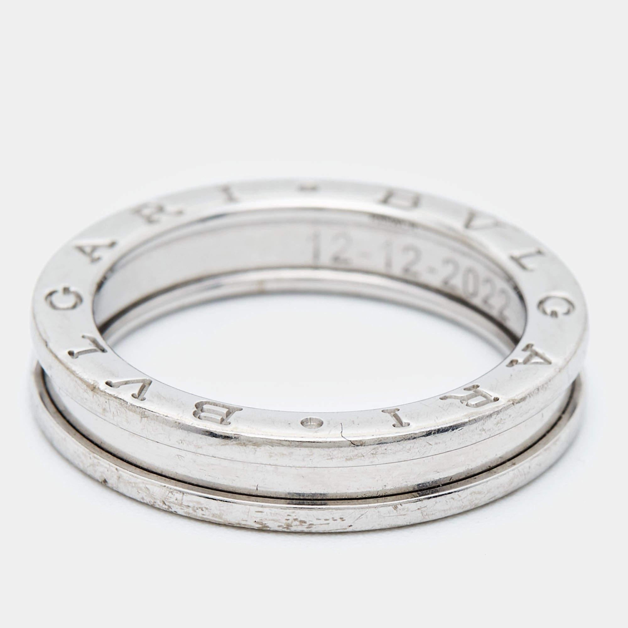 Unique and modern, this charming B.Zero1 band ring is from one of Bvlgari's iconic collections . Beautifully crafted from 18k white gold, the ring has signature engravings. Inspired by the Colosseum, this ring merges exceptional creative vision and