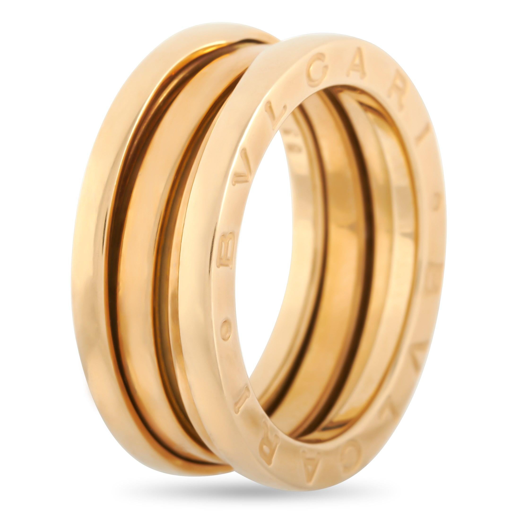 The Bvlgari B.Zero1 18K Yellow Gold Double Ring is inspired by the famous oval amphitheater in Rome, the Colosseum. Emphasizing shape and form, this piece features two bands stacked together to form a thick and bold 8mm band. This ring clearly