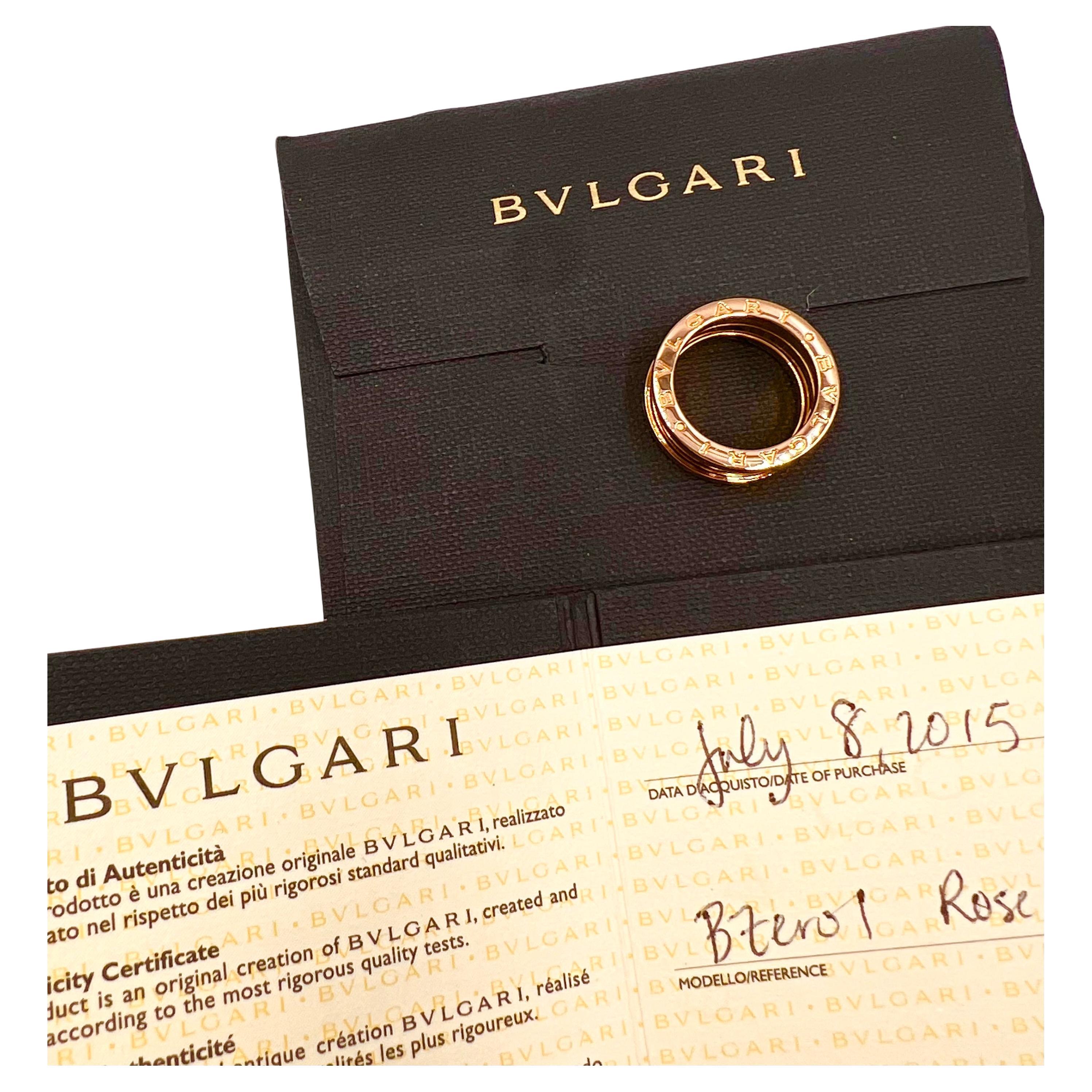 BVLGARI B.zero1 3-band ring in polished 18k rose gold.  Expandable accordion design, measuring 7.8mm expanding to approximately 9.55mm in width. Flat edge of both sides signed 'BVLGARI'. Finger size 5.5. Includes Bvlgari ring box, as well as