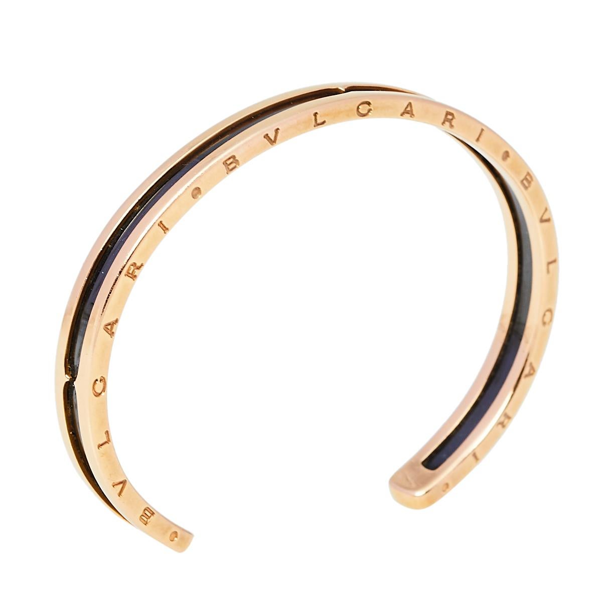 Adorn your wrist with this gem of a bracelet from Bvlgari. The piece is from their B.Zero1 collection and has been crafted from 18k rose gold and beautifully lined with carbon-coated steel. It is complete with the brand's lettering on the contours.
