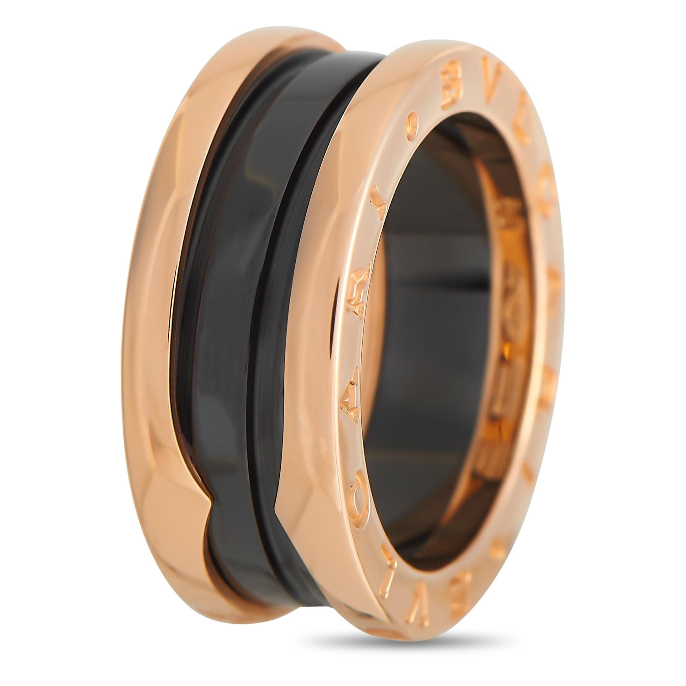 This Bvlgari B.Zero1 band ring beautifully combines opulent 18K Rose Gold with a black ceramic center. Intricate details like the luxury brand’s moniker imprinted on the sides make this an exquisite addition to any collection. It measures 7mm wide